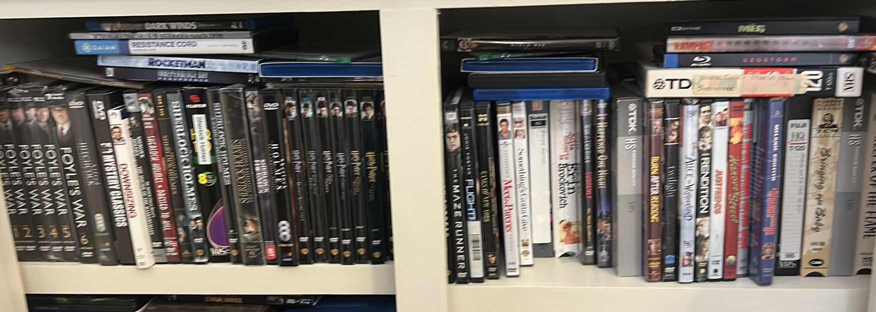 Photo 1 of 2 SHELVES OF DVD’s