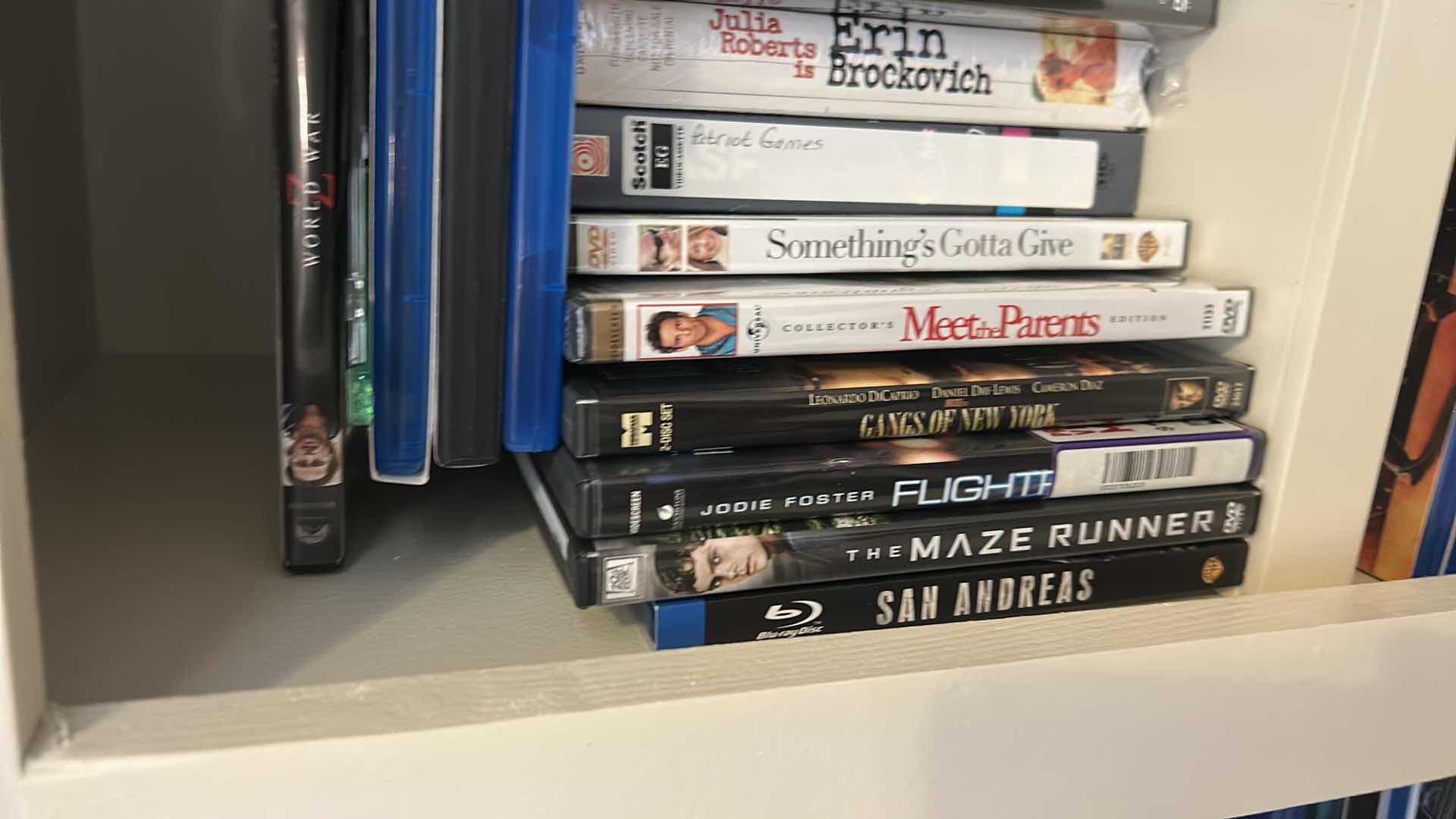 Photo 1 of 2 SHELVES OF DVD’s