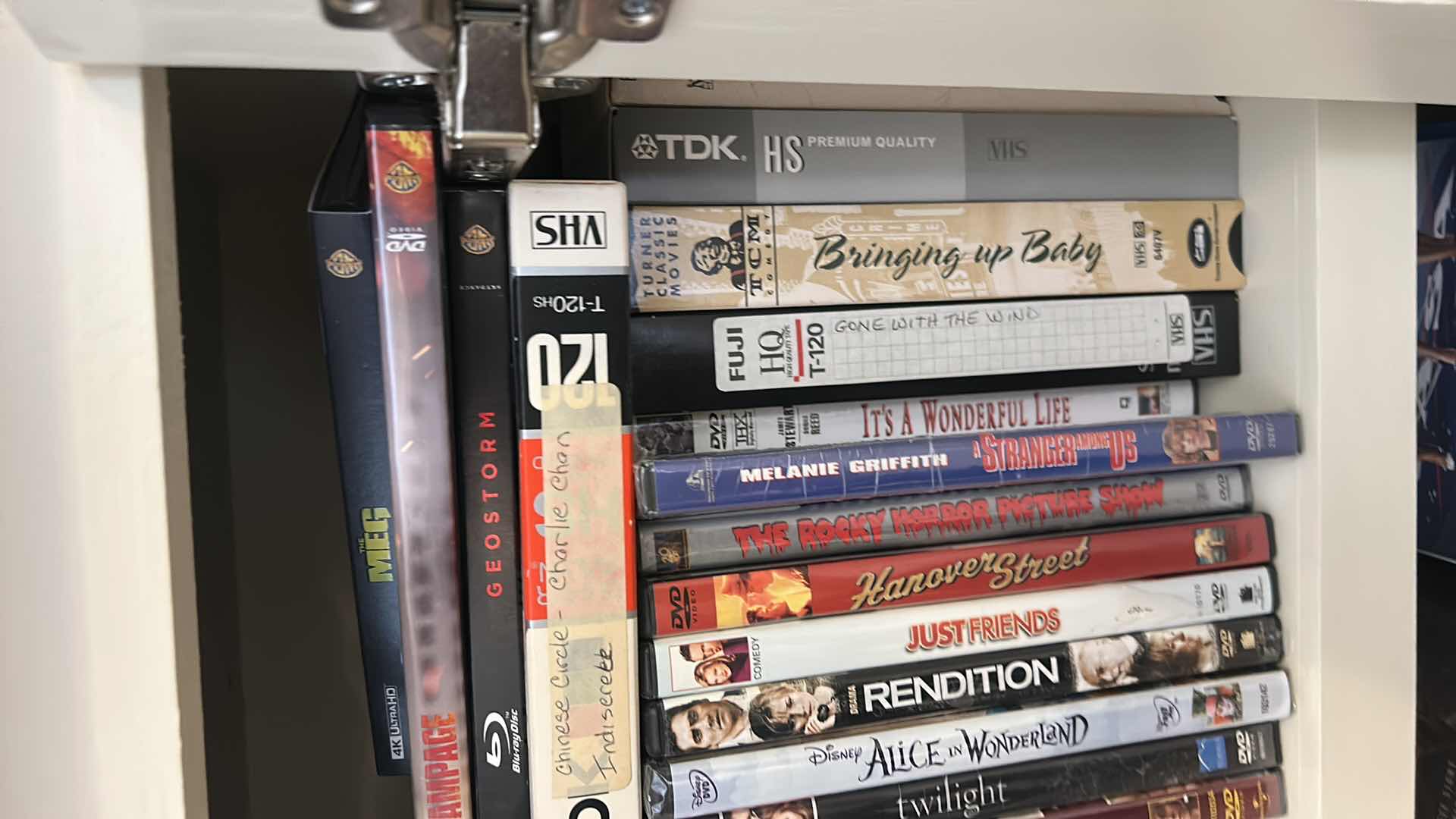 Photo 1 of 2 SHELVES OF DVD’s