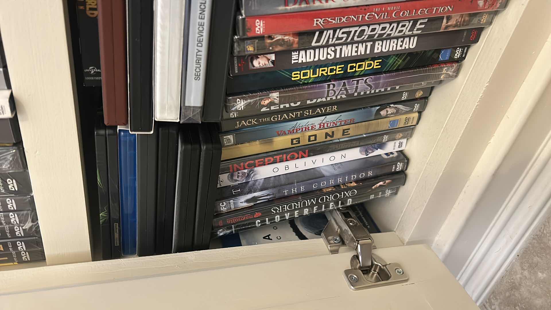 Photo 1 of 2 SHELVES OF DVD’S