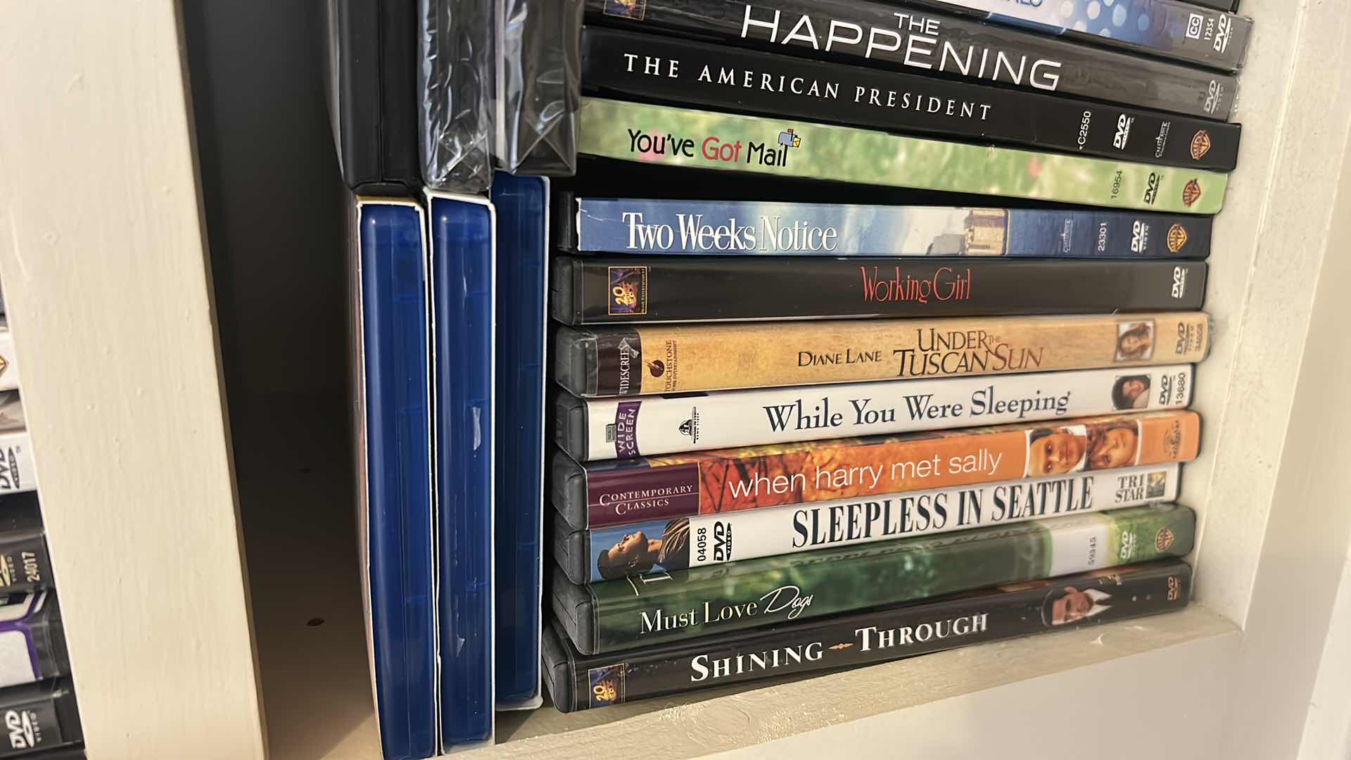 Photo 1 of 2 SHELVES OF DVD’S