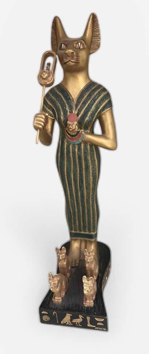 Photo 1 of CERAMIC DECORATIVE STATUE OF THE ANCIENT EGYPTIAN CAT GODDESS BASTET, OFTEN DEPICTED HOLDING A SISTRUM AND SURROUNDED BY SMALLER KITTENS. H13”