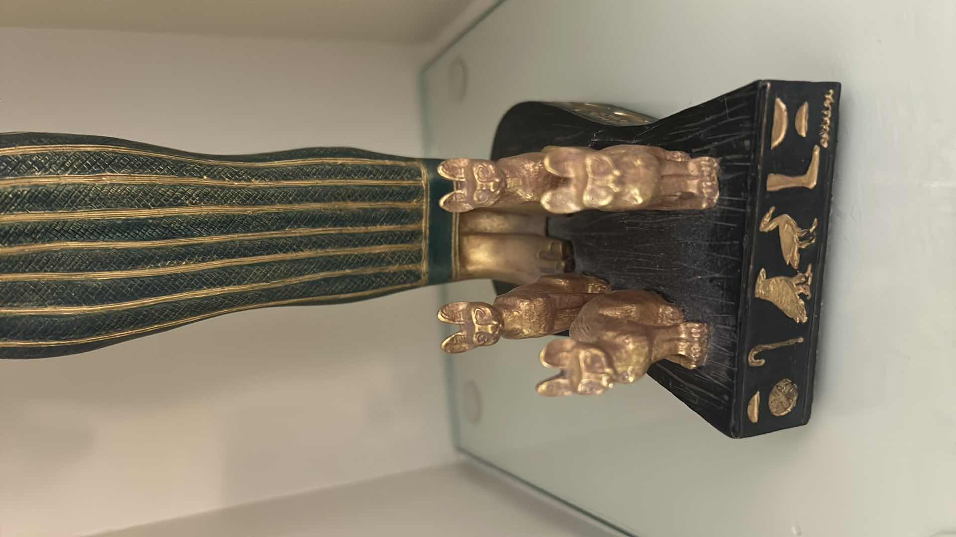 Photo 1 of CERAMIC DECORATIVE STATUE OF THE ANCIENT EGYPTIAN CAT GODDESS BASTET, OFTEN DEPICTED HOLDING A SISTRUM AND SURROUNDED BY SMALLER KITTENS. H13”