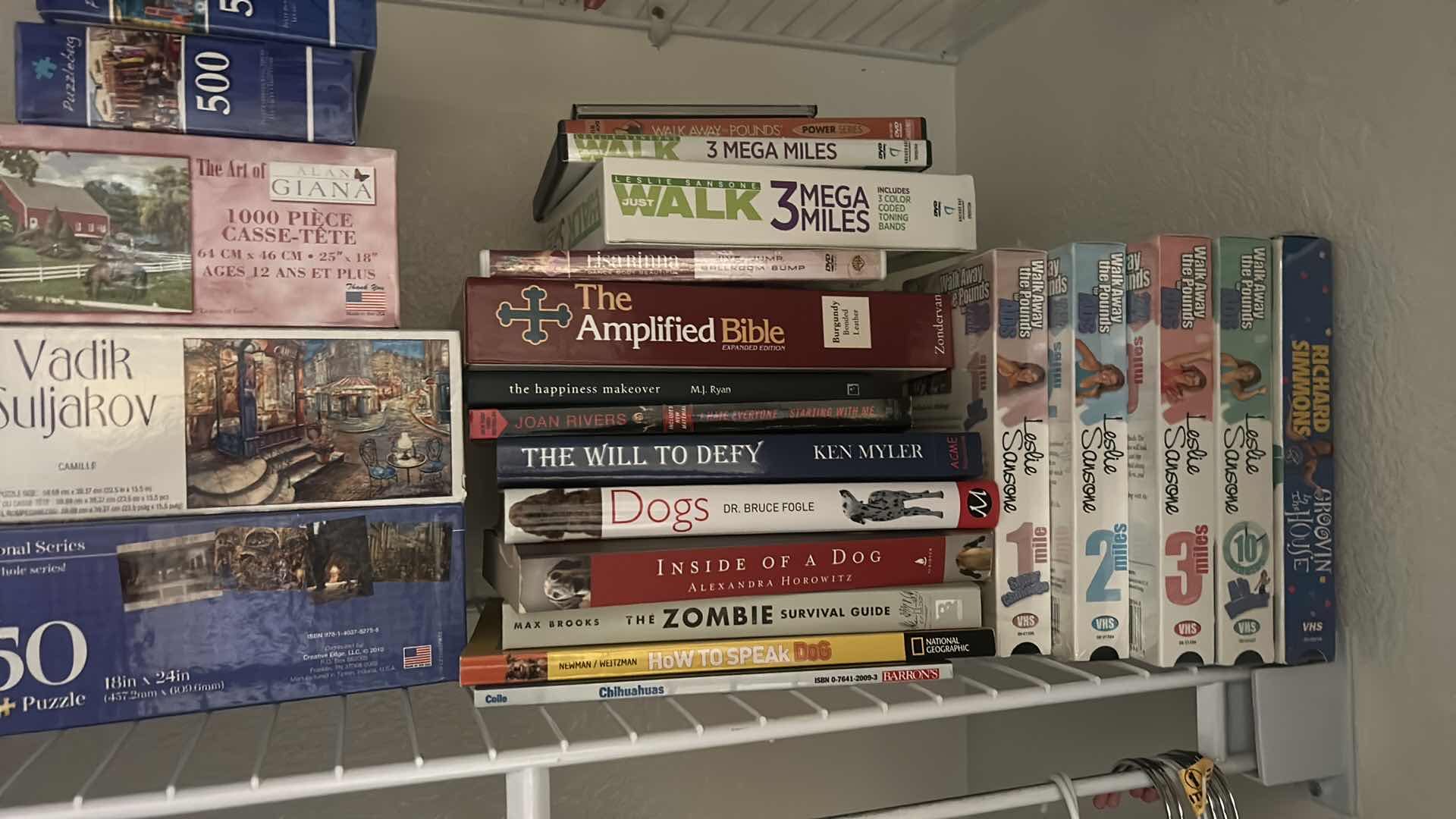Photo 1 of CONTENTS ON SHELF- PUZZLES, BOOKS, VHS, AND MORE