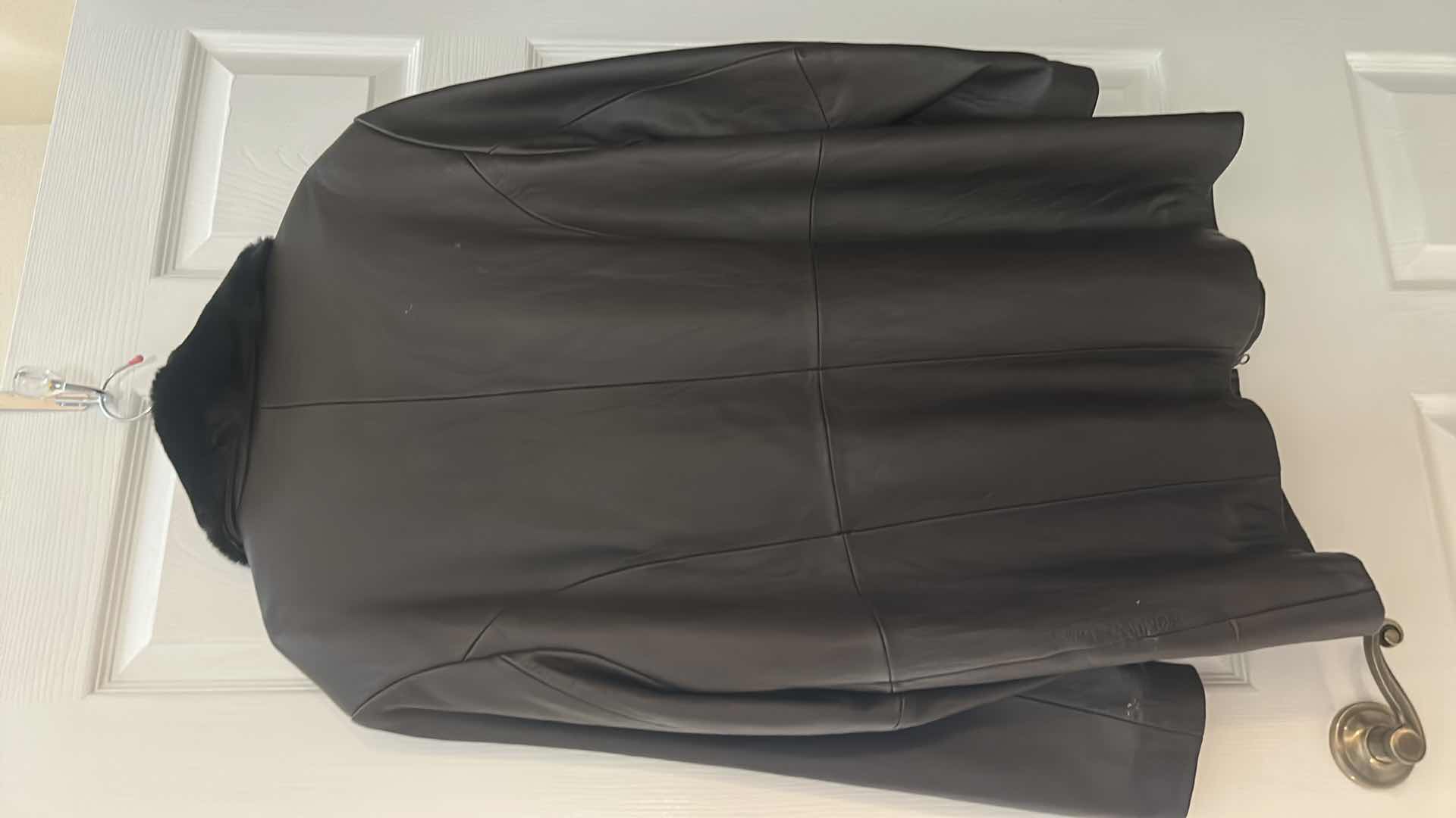 Photo 1 of BLACK LEATHER COAT WITH A REMOVABLE FAUX FUR COLLAR BY LEATHER ELEMENTS. SIZE L