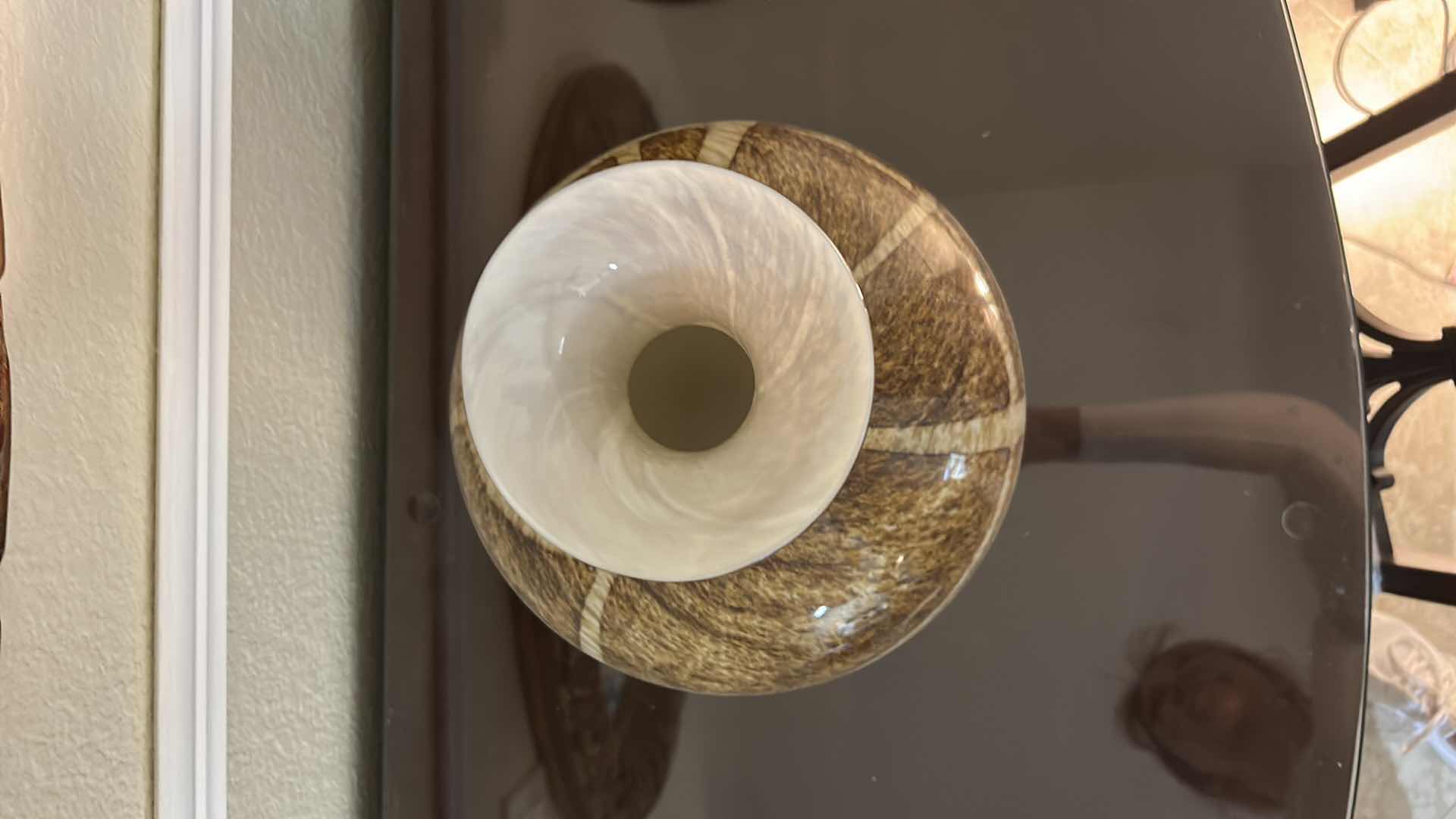 Photo 1 of DECORATIVE HAND-BLOWN ART GLASS VASE FEATURING A BROWN AND WHITE SWIRLED, SPECKLED PATTERN WITH A WIDE MOUTH. H12”