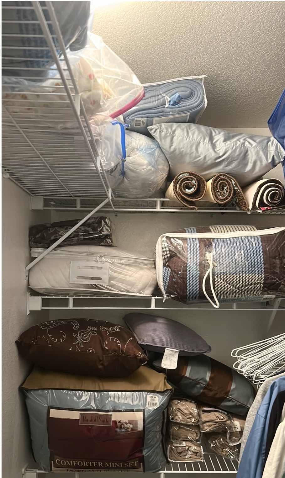 Photo 1 of BEDDING, CHAIR COVERS, RUGS AND MORE ON SHELVES IN CLOSET