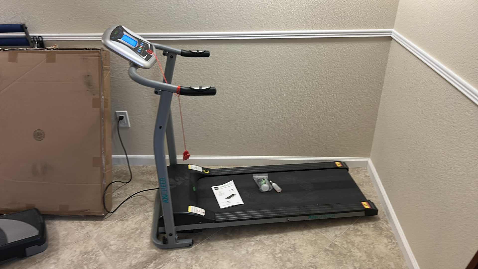 Photo 1 of ANCHEER FOLDABLE TREADMILL