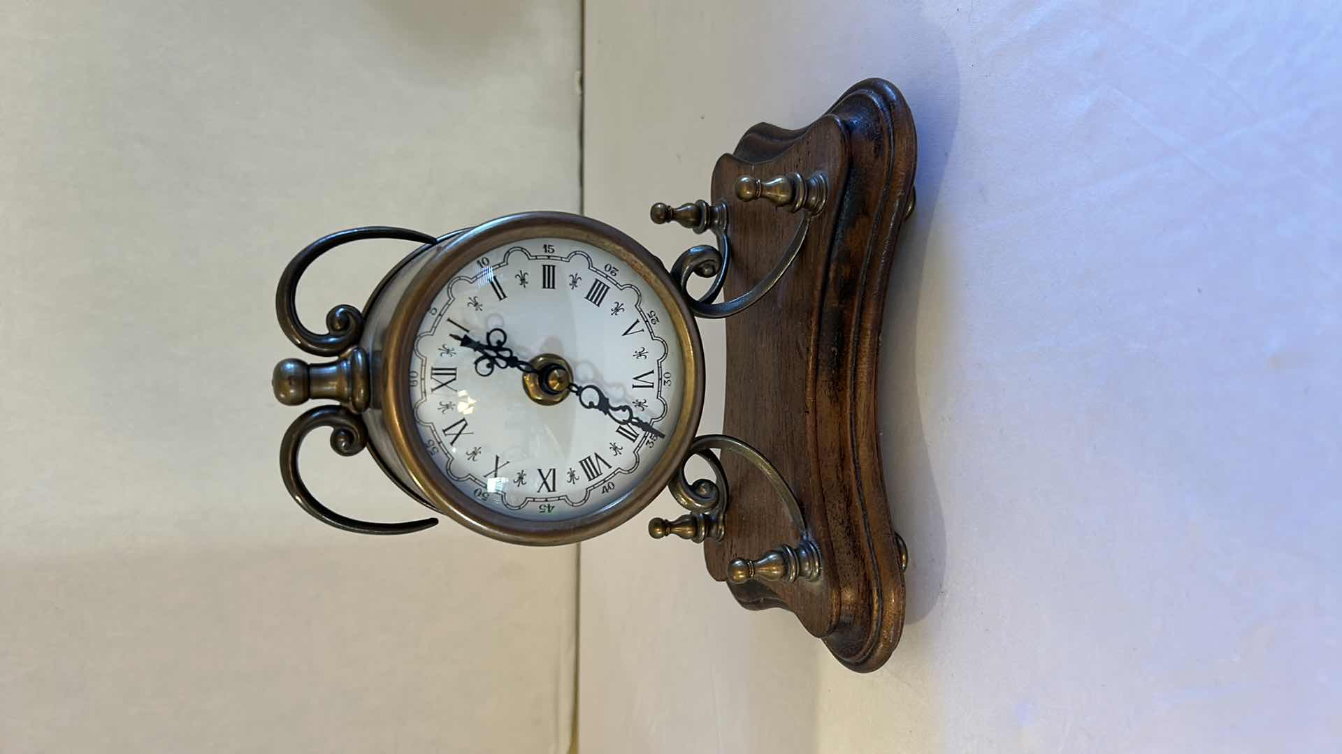 Photo 1 of WOOD BASE TABLE TOP CLOCK H 9”