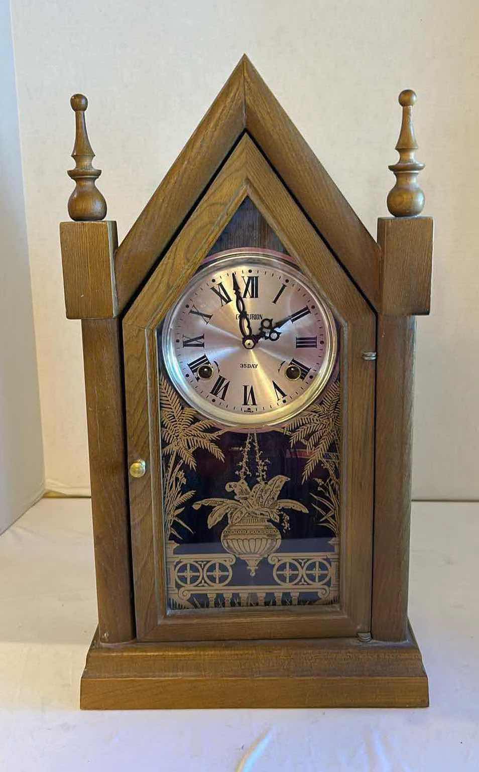 Photo 1 of CENTURION 35 DAY KEY WIND PENDULUM STEEPLE CLOCK H 20”