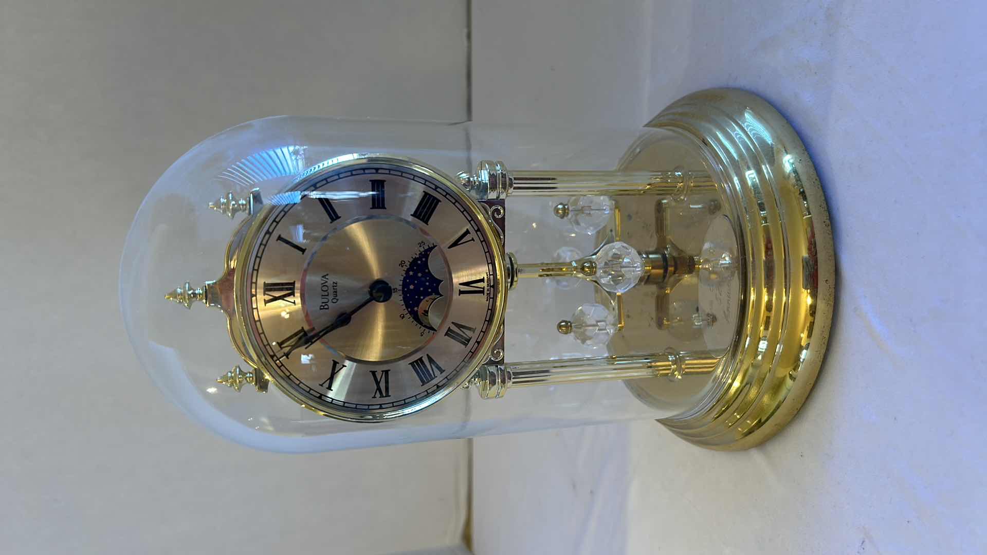 Photo 1 of BULOVA QUARTZ MANTLE CLOCK W GLASS DOME H 10”