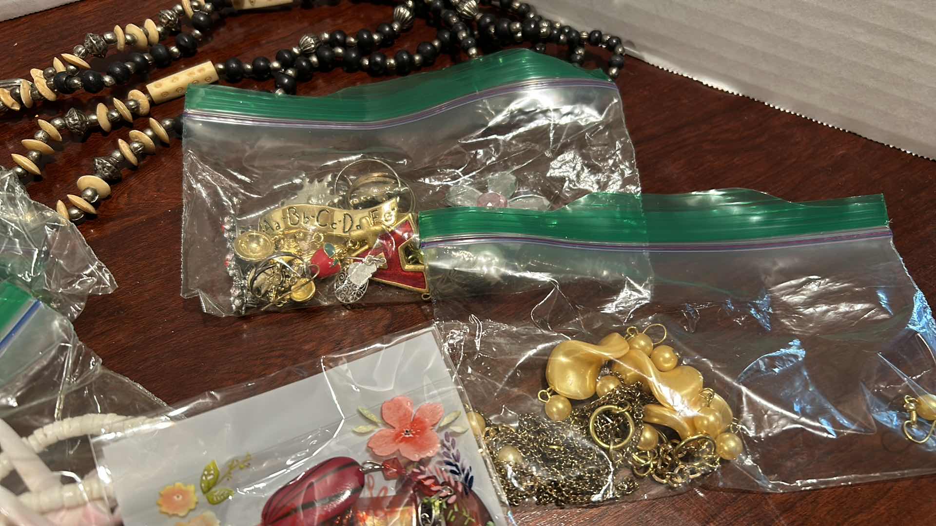 Photo 4 of CONTENT OF BAGS- COSTUME JEWELRY