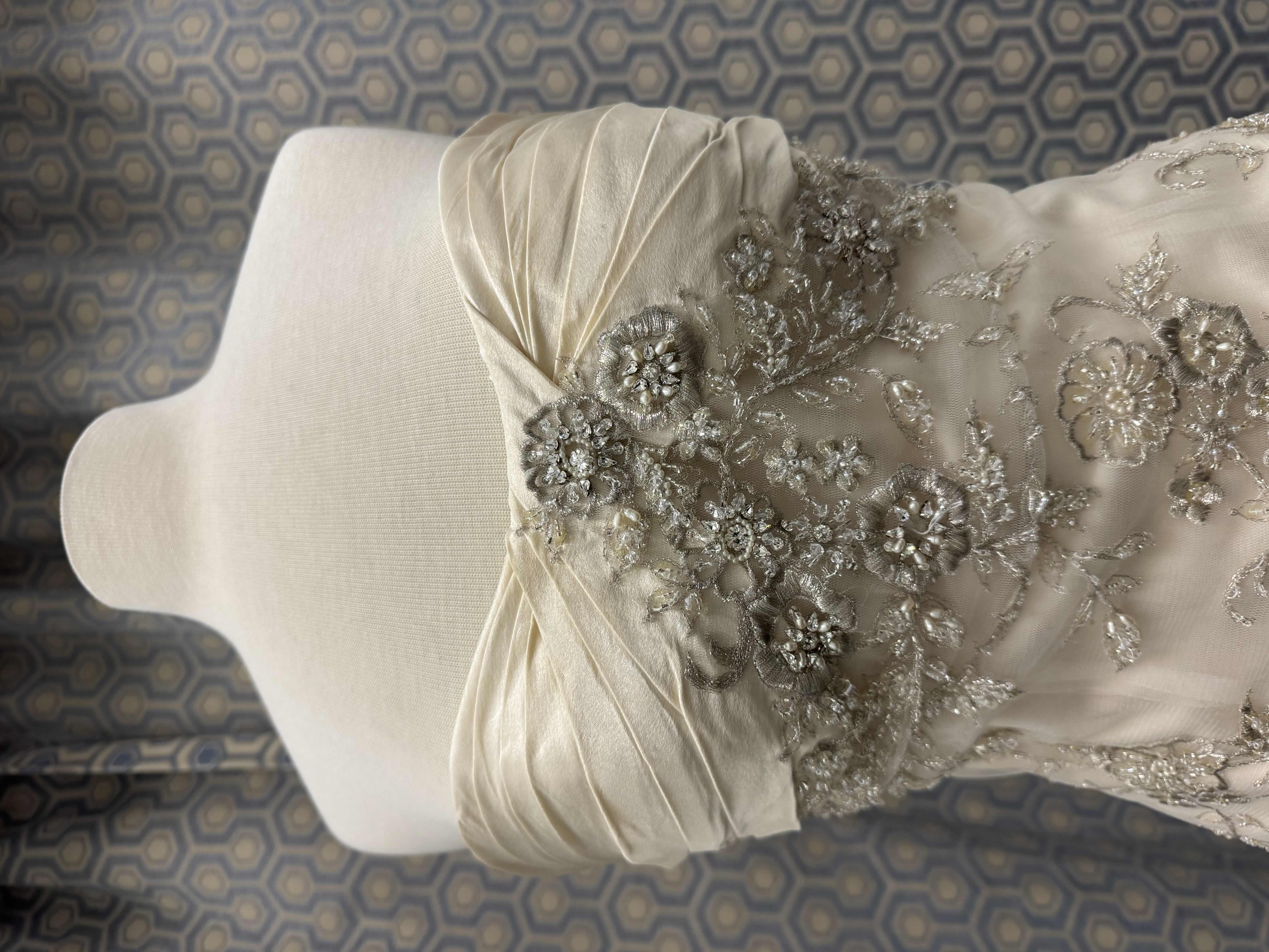 Photo 1 of BRIDAL GOWN CASABLANCA STRAPLESS SWEETHEART NECKLINE MERMAID SILHOUETTE CRYSTALS ON TULE OVER SILKY SATIN CHAMPAGNE IVORY/SILVER SIZE 12