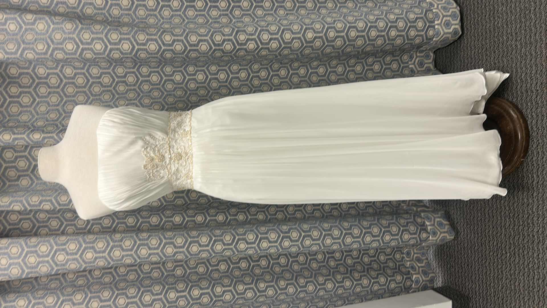 Photo 1 of BRIDAL GOWN “MAGGIE SOTTERO” ONE-PIECE STRAPLESS, SLIM-LINE GOWN WITH ZIPPER OVER INNER CORSET CLOSURE. DELICATE LACE FEATURING SWAROVSKI CRYSTALS. SIZE 10 