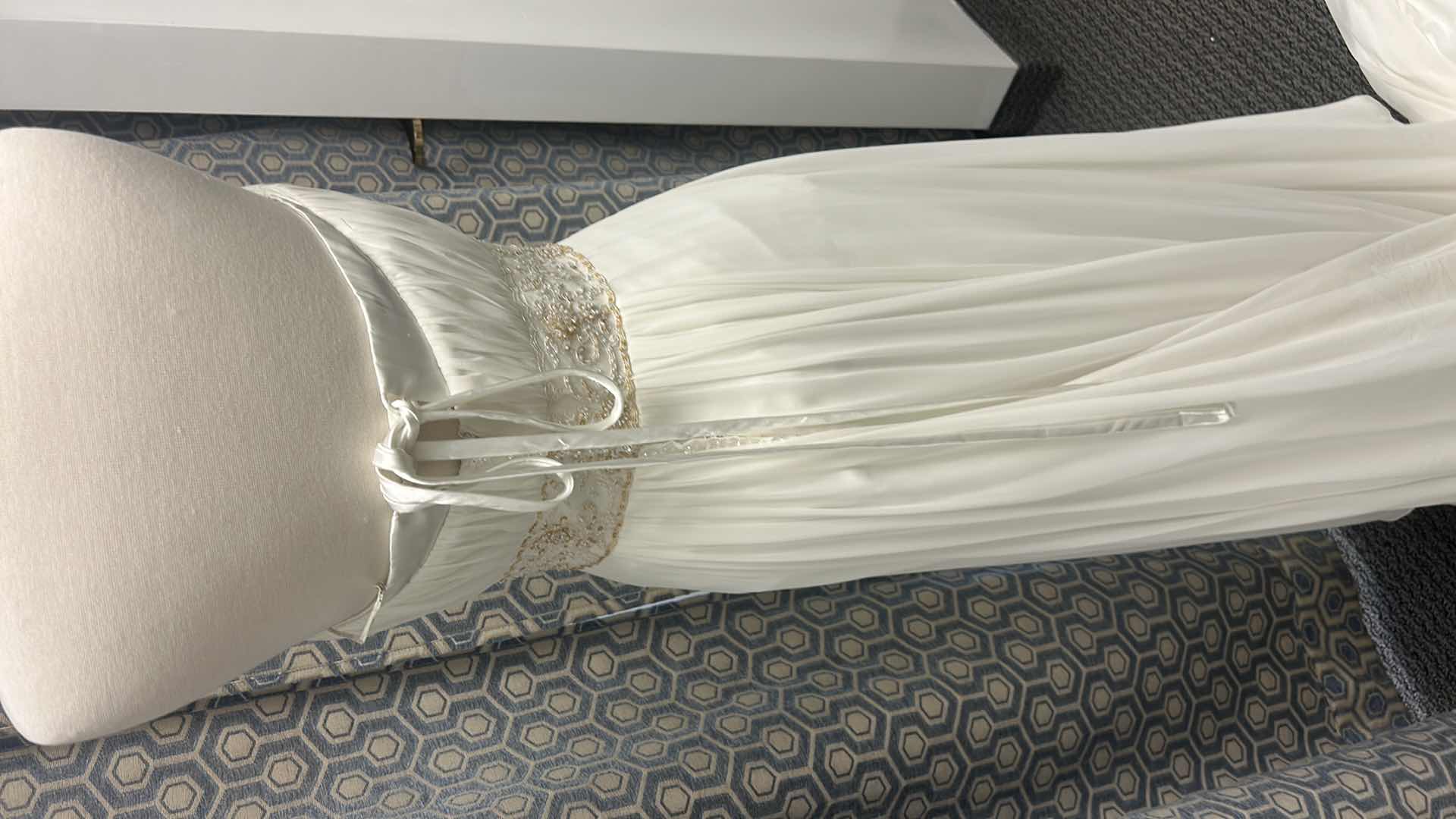 Photo 1 of BRIDAL GOWN “MAGGIE SOTTERO” ONE-PIECE STRAPLESS, SLIM-LINE GOWN WITH ZIPPER OVER INNER CORSET CLOSURE. DELICATE LACE FEATURING SWAROVSKI CRYSTALS. SIZE 10 