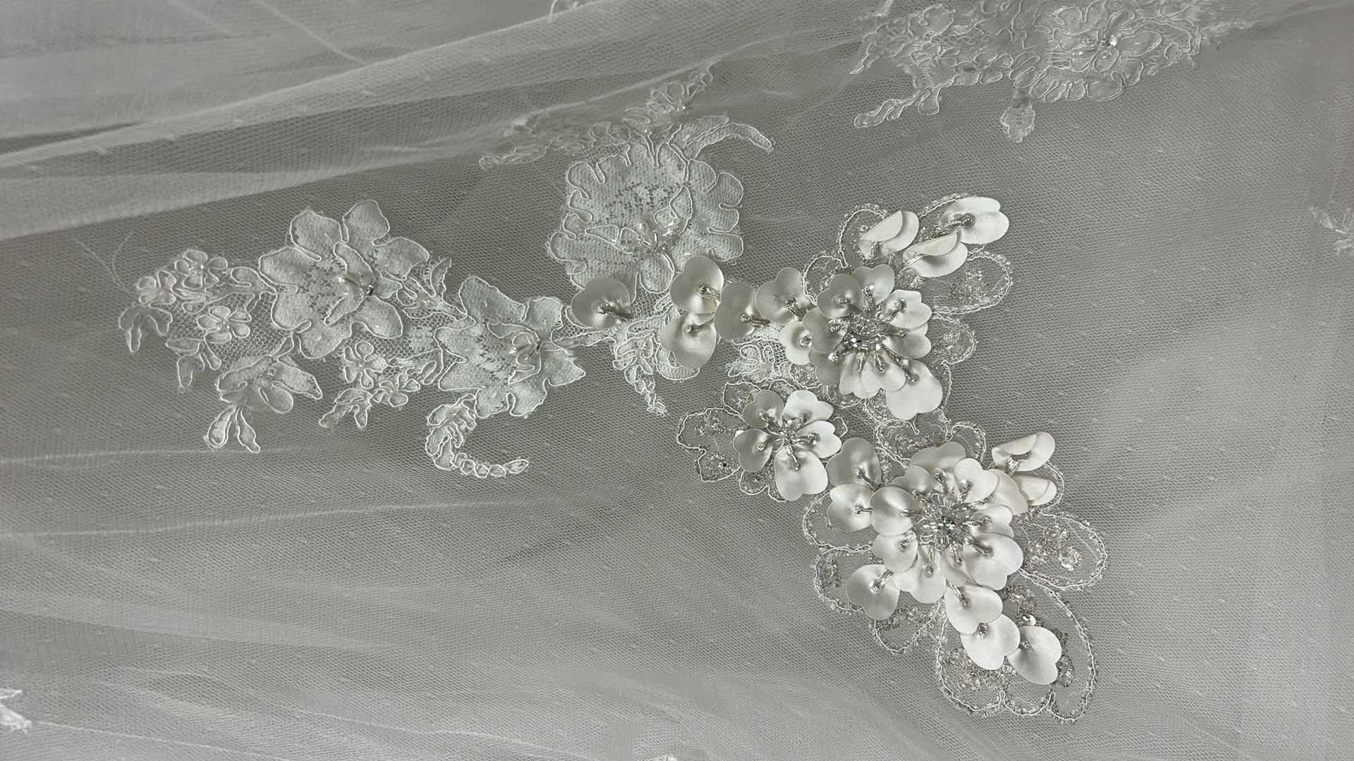 Photo 1 of BRIDAL GOWN “MAGGIE SOTTERO COUTURE”  ALABASTER IVORY LACE WITH PEWTER ACCENT SOFT SHIMMER SATIN FLOWERS FEATURING SWAROVSKI CRYSTALS SIZE 2,