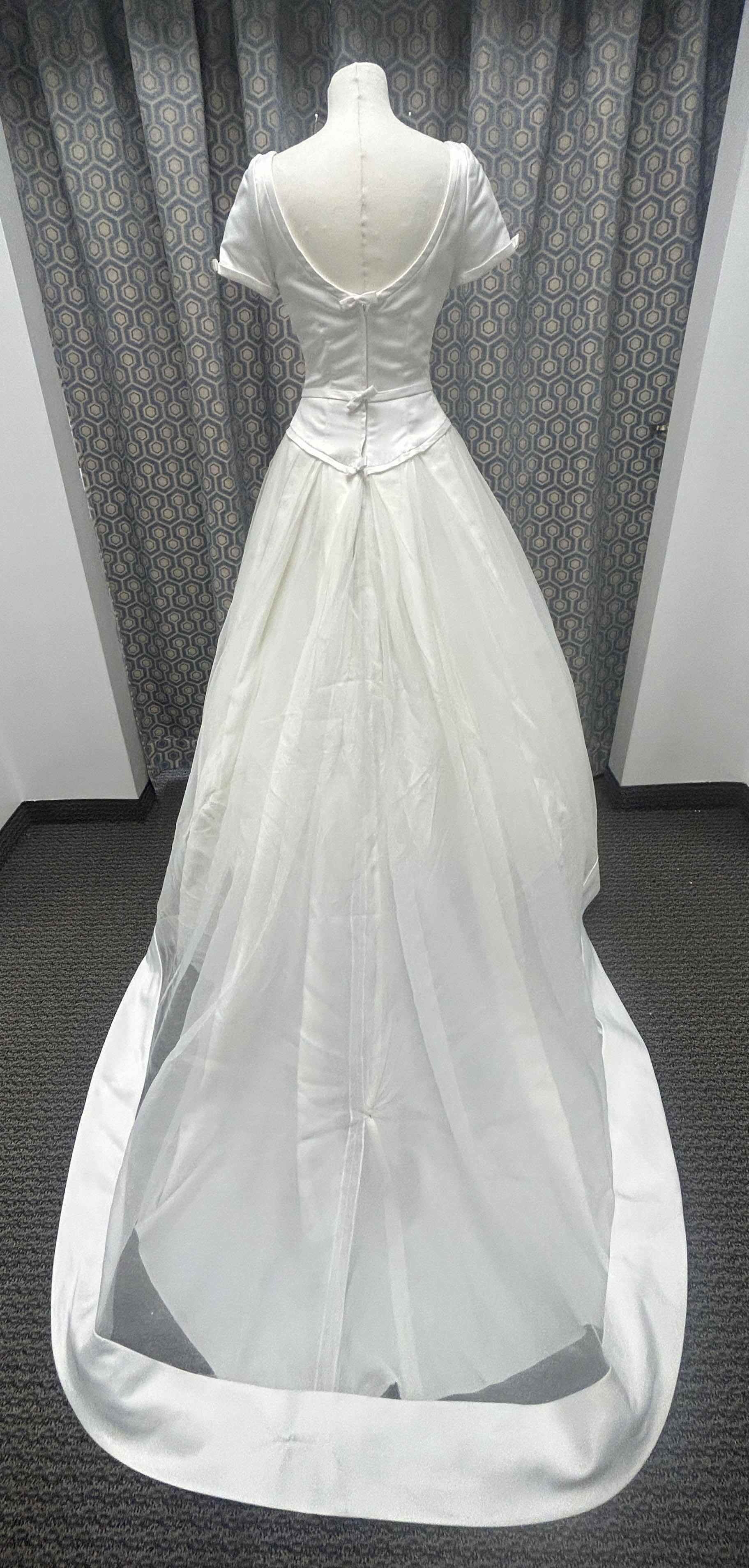 Photo 1 of BRIDAL GOWN “BRIDAL ELEGANCE BY PALOMA BLANCA” , IVORY SHORT SLEEVE FULL SKIRT, MEDIUM TRAIN, SIZE 6. 