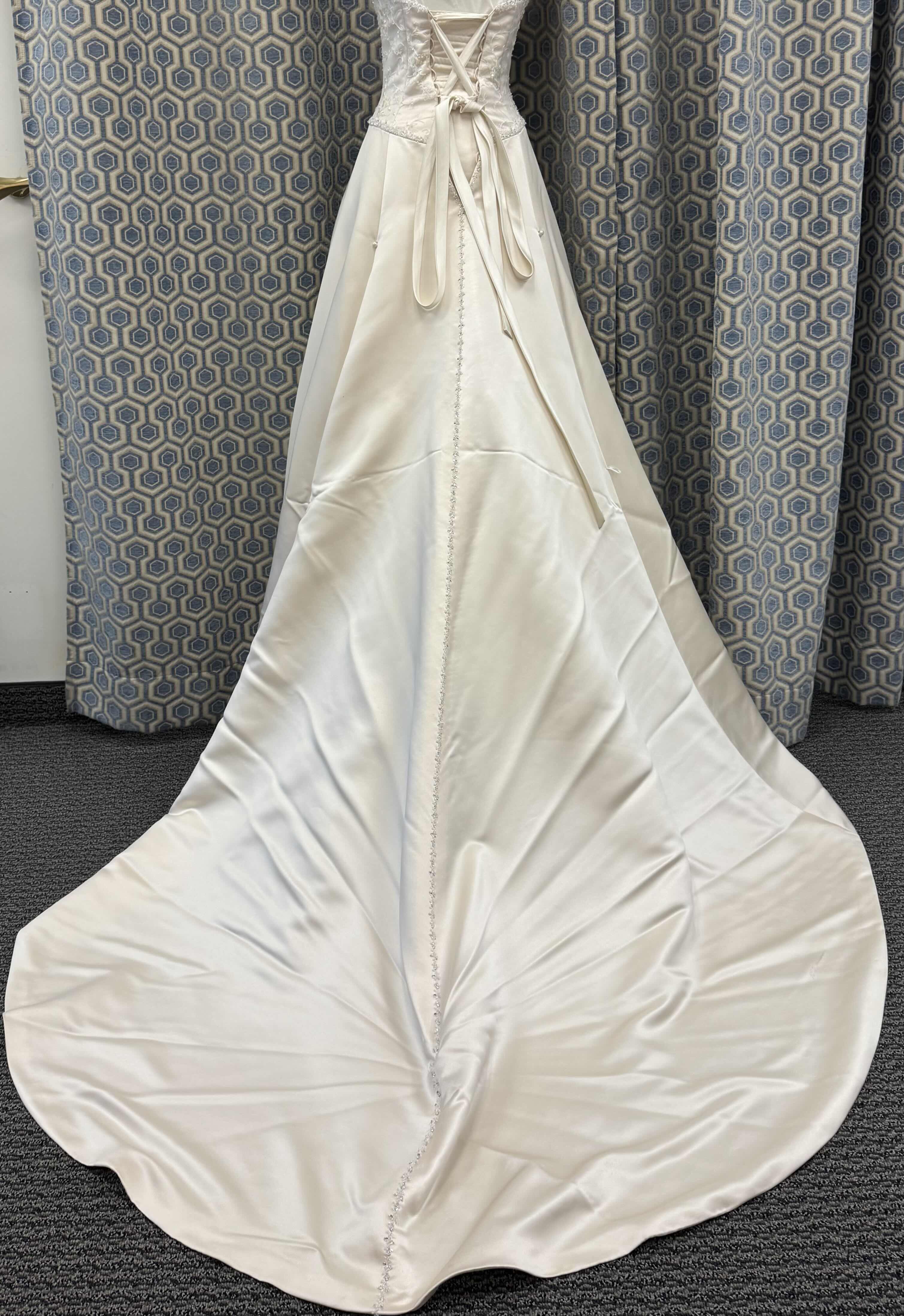 Photo 1 of BRIDAL GOWN "MAGGIE SOTTERO" ALINE SATIN WITH STONES CHAMPAGNE SIZE 6