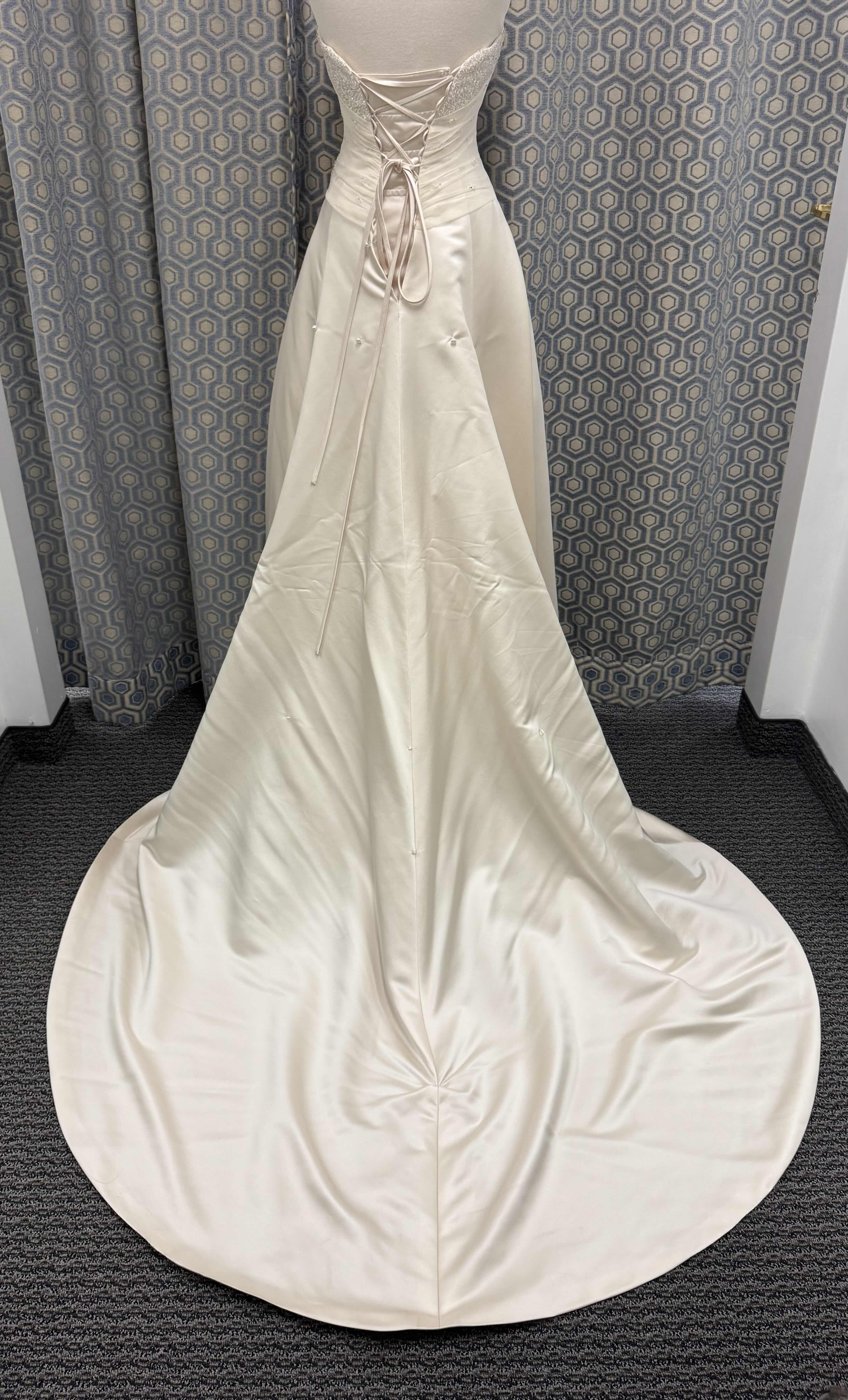 Photo 1 of BRIDAL GOWN MAGGIE SOTTERO ONE PIECE SATIN A LINE MEDIUM TRAIN CORSET BACK LIGHT GOLD SIZE 6