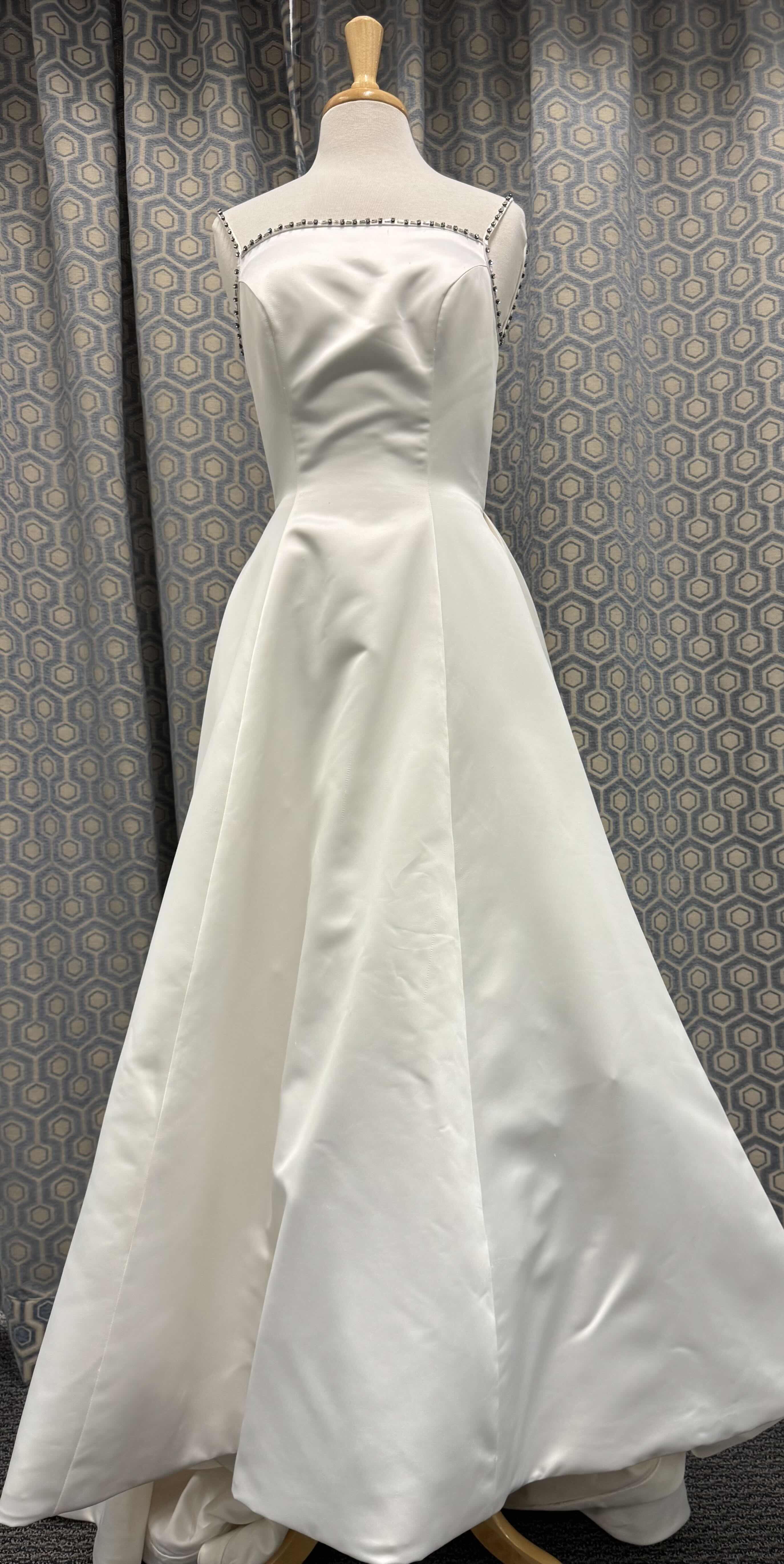 Photo 1 of BRIDAL GOWN "SARIN GOWN" SPAGHETTI STRAP A LINE  IVORY SIZE 6