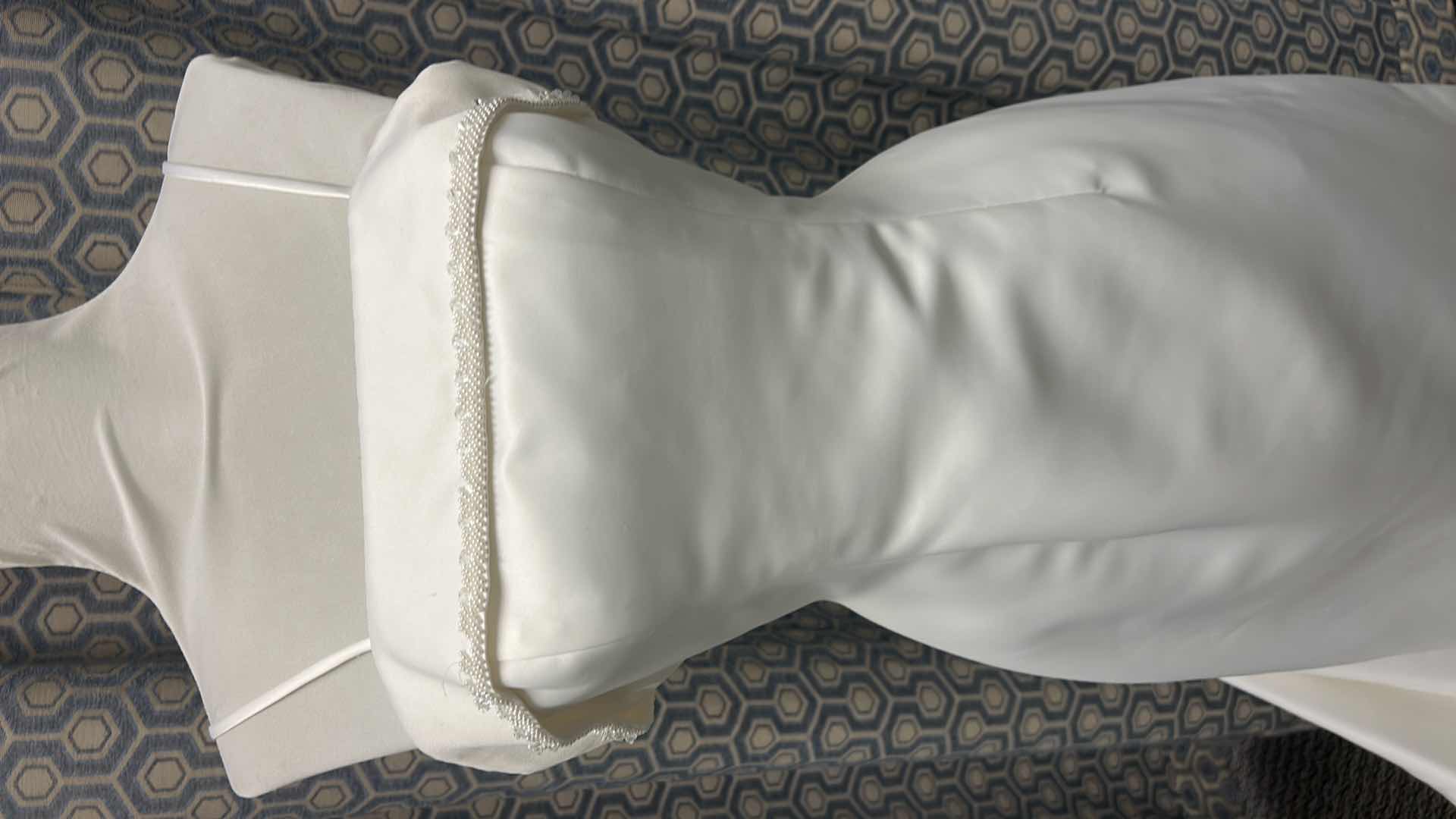 Photo 1 of BRIDAL GOWN, “PALOMA  BLANCO” SHEATH GOWN WITH OPTIONAL SPAGHETTI STRAP CRYSTAL BEADING ON THE TOP, DETACHABLE TRAIN IN IVORY, SIZE 8.