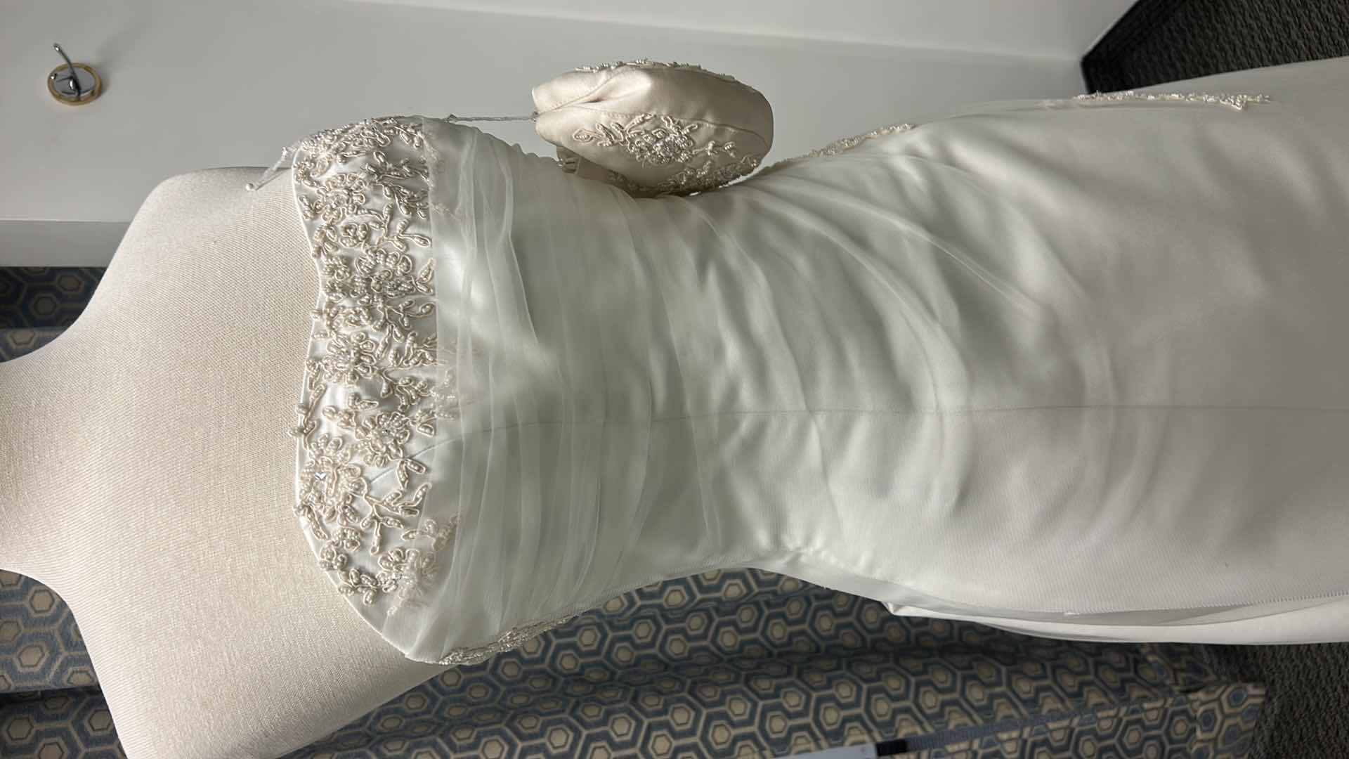 Photo 1 of BRIDAL GOWN, MAGGIE SOTTERO, ONE-PIECE A-LINE STRAPLESS WEDDING GOWN WITH COVERED BUTTONS OVER INNER CLOSURE, TULLE OVERLAY WITH DELICATE LACE, DIAMOND WHITE/CHAMPAGNE, SIZE 8/10, 