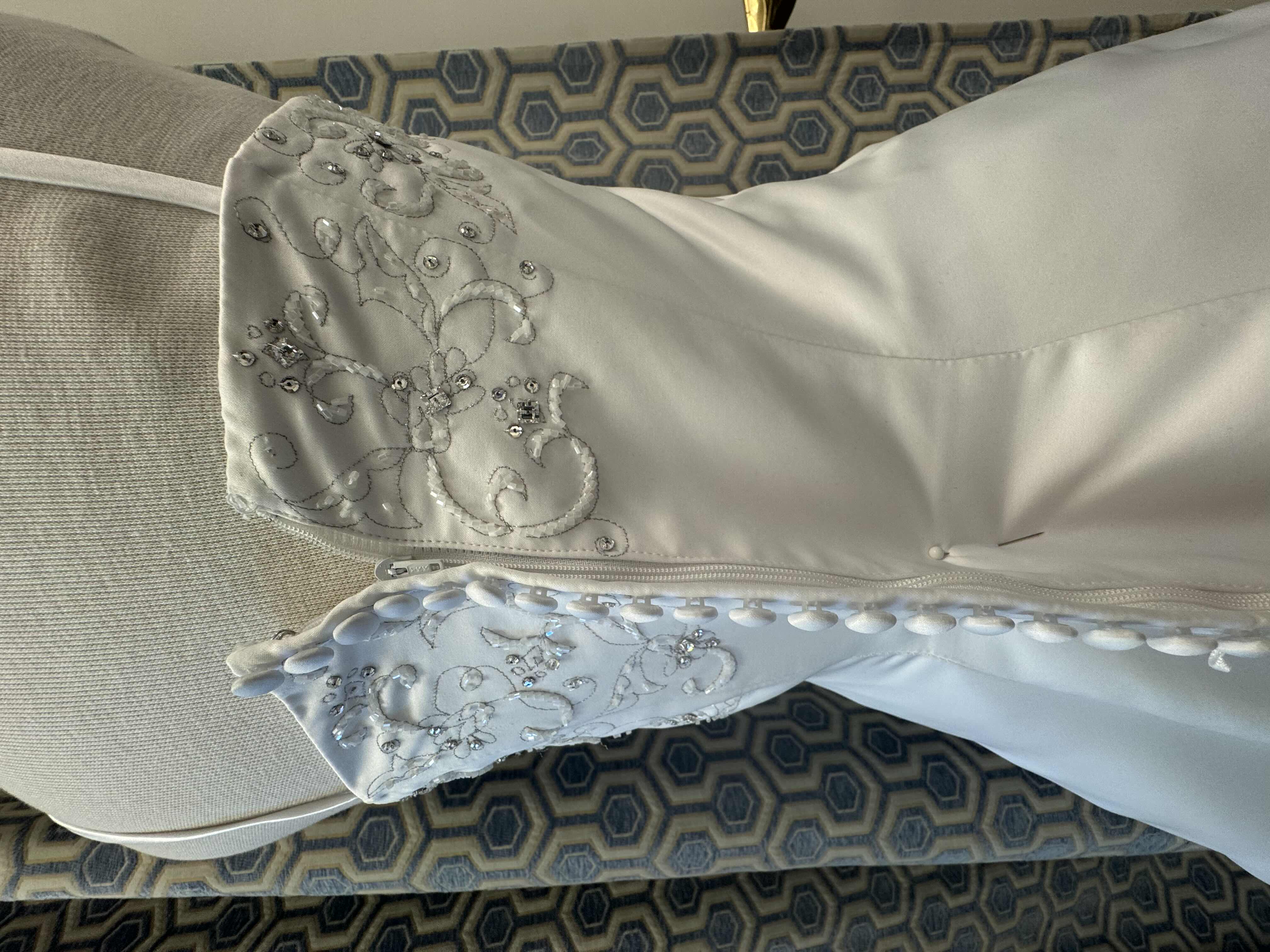 Photo 1 of BRIDAL GOWN MICHAEL ANGELO STRAPLESS A LINE GOWN FEATURES AN ASYMMETRICAL DRAPED THE FRONT NECKLINE IS EMBELLISHED WITH SWAROVSKI CRYSTALS DIAMOND WHITE SIZE 10