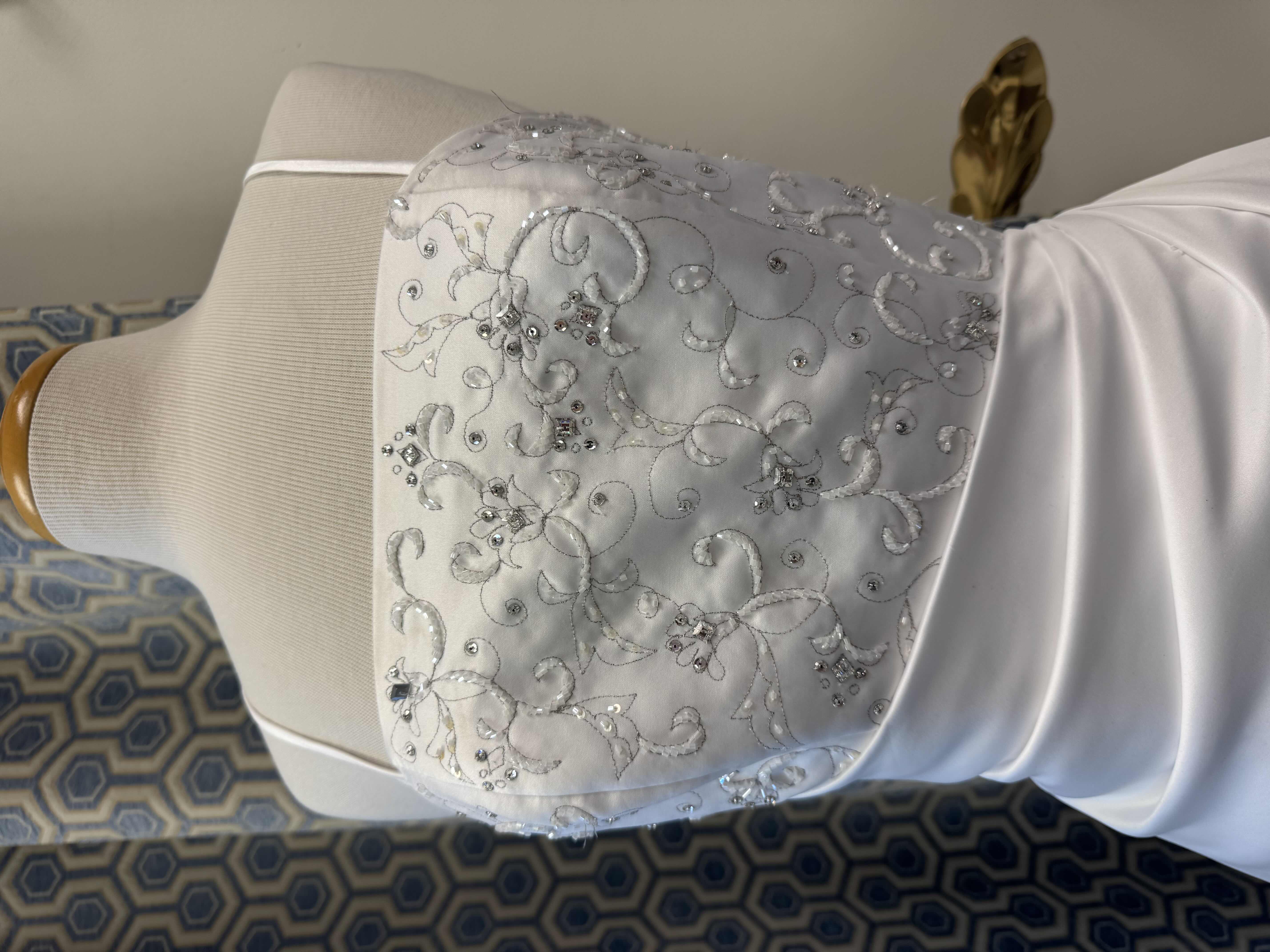Photo 1 of BRIDAL GOWN MICHAEL ANGELO STRAPLESS A LINE GOWN FEATURES AN ASYMMETRICAL DRAPED THE FRONT NECKLINE IS EMBELLISHED WITH SWAROVSKI CRYSTALS DIAMOND WHITE SIZE 10