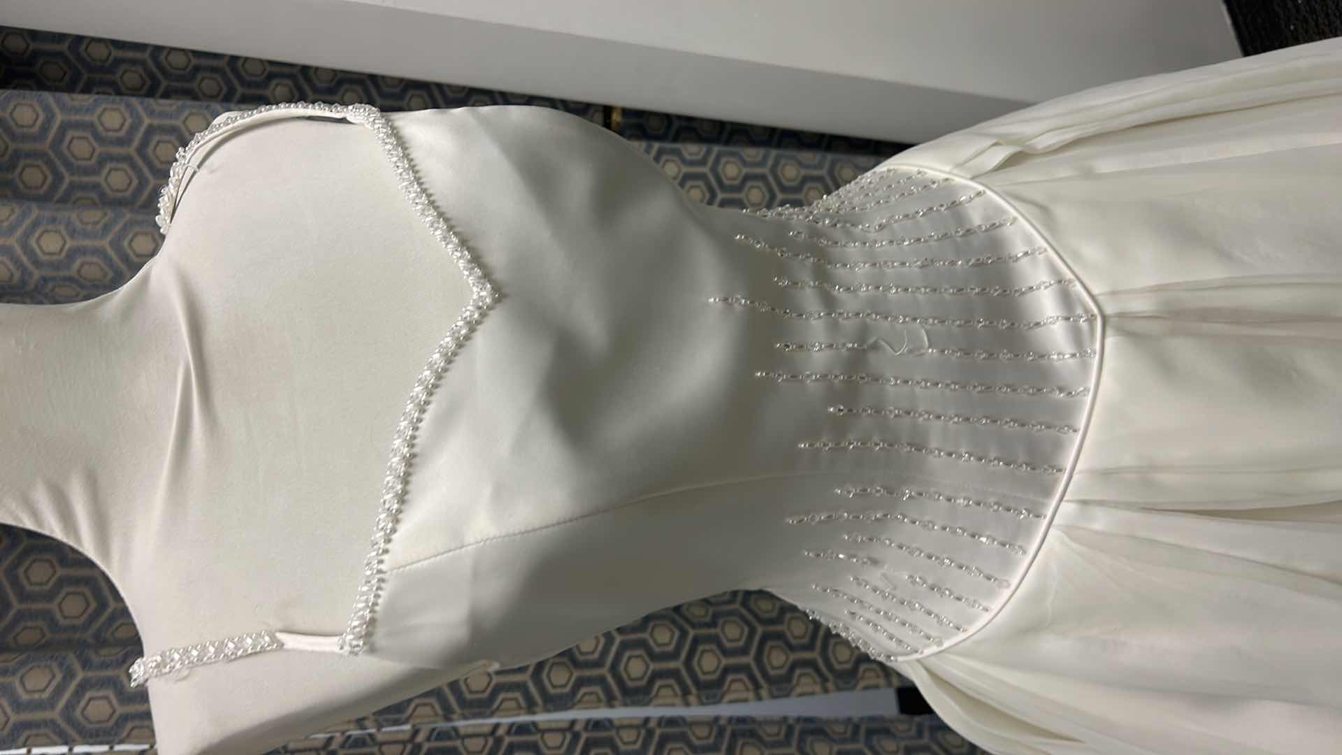 Photo 1 of BRIDAL GOWN, “PALOMA BLANCA” SATIN BODICE WITH PEARL AND CRYSTAL DETAIL, OPTIONAL SPAGHETTI STRAPS, FULL ORGANZA OVER SATIN SKIRT, MEDIUM TRAIN, IVORY, SIZE 10. $1500