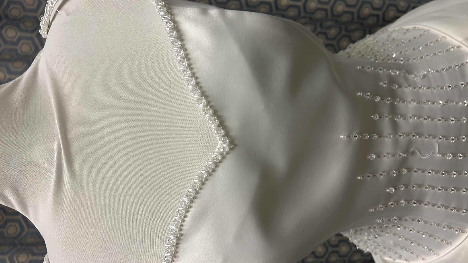 Photo 1 of BRIDAL GOWN, “PALOMA BLANCA” SATIN BODICE WITH PEARL AND CRYSTAL DETAIL, OPTIONAL SPAGHETTI STRAPS, FULL ORGANZA OVER SATIN SKIRT, MEDIUM TRAIN, IVORY, SIZE 10. $1500