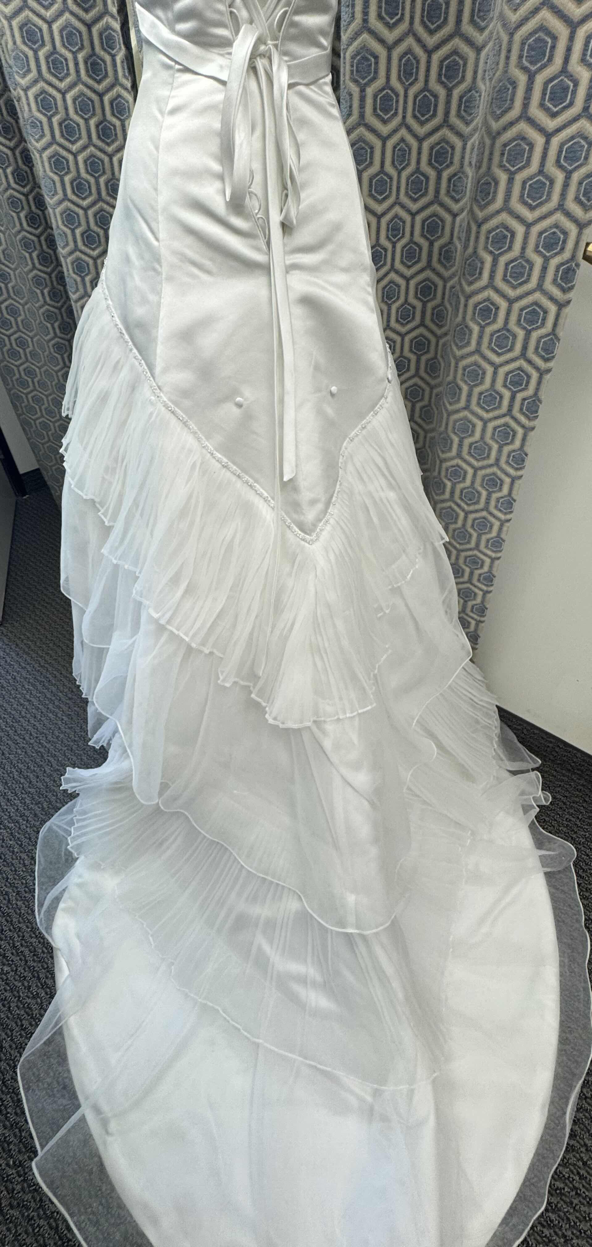 Photo 1 of BRIDAL GOWN MAGGIE SOTTERO STRAPLESS ONE PIECE GOWN FEATURING A TIERED SKIRT CREATED  FROM PLEATED ORGANZA AND TULLE SWAROVSKI BUGLE BEADS DIAMOND WHITE SIZE 6