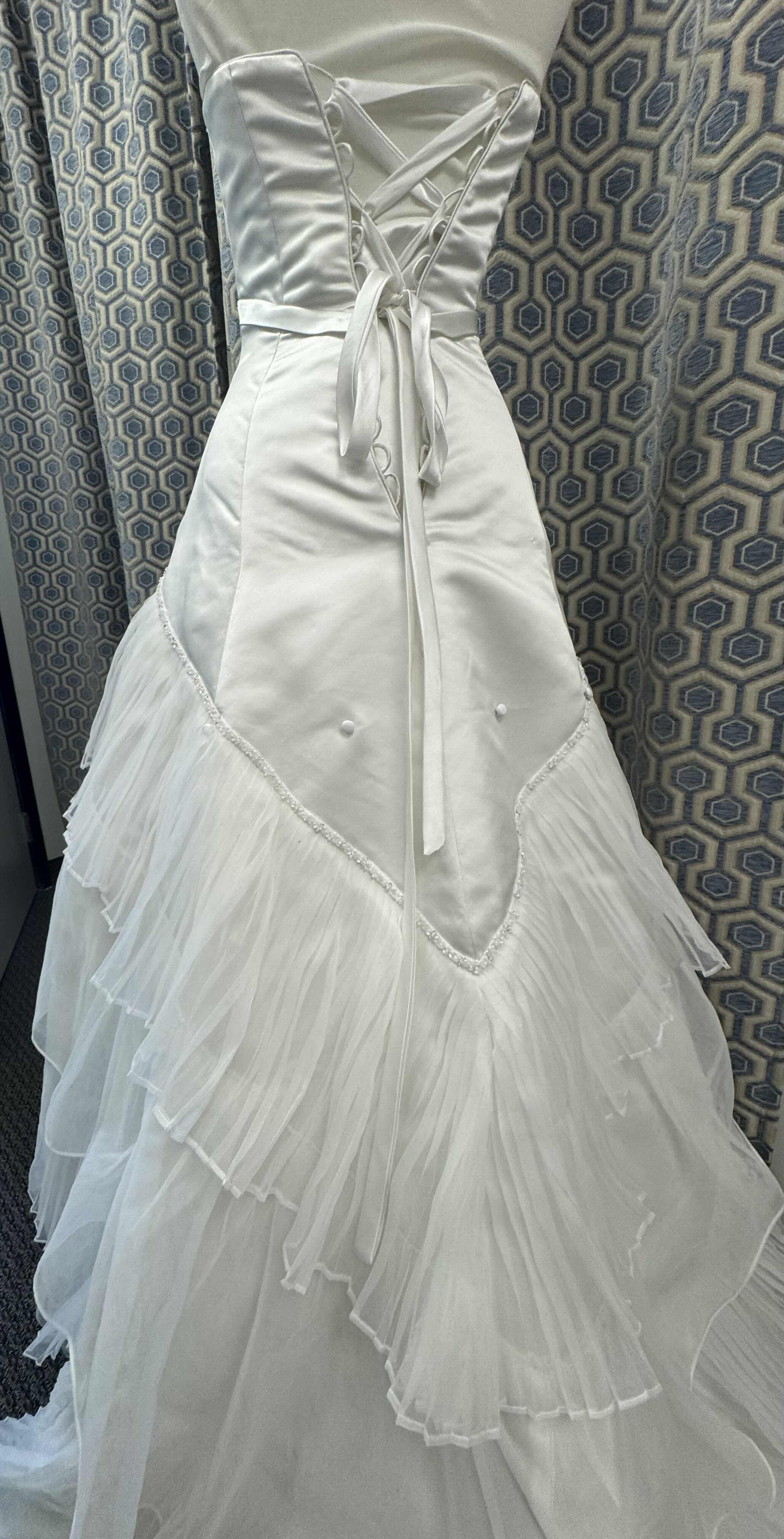 Photo 1 of BRIDAL GOWN MAGGIE SOTTERO STRAPLESS ONE PIECE GOWN FEATURING A TIERED SKIRT CREATED  FROM PLEATED ORGANZA AND TULLE SWAROVSKI BUGLE BEADS DIAMOND WHITE SIZE 6