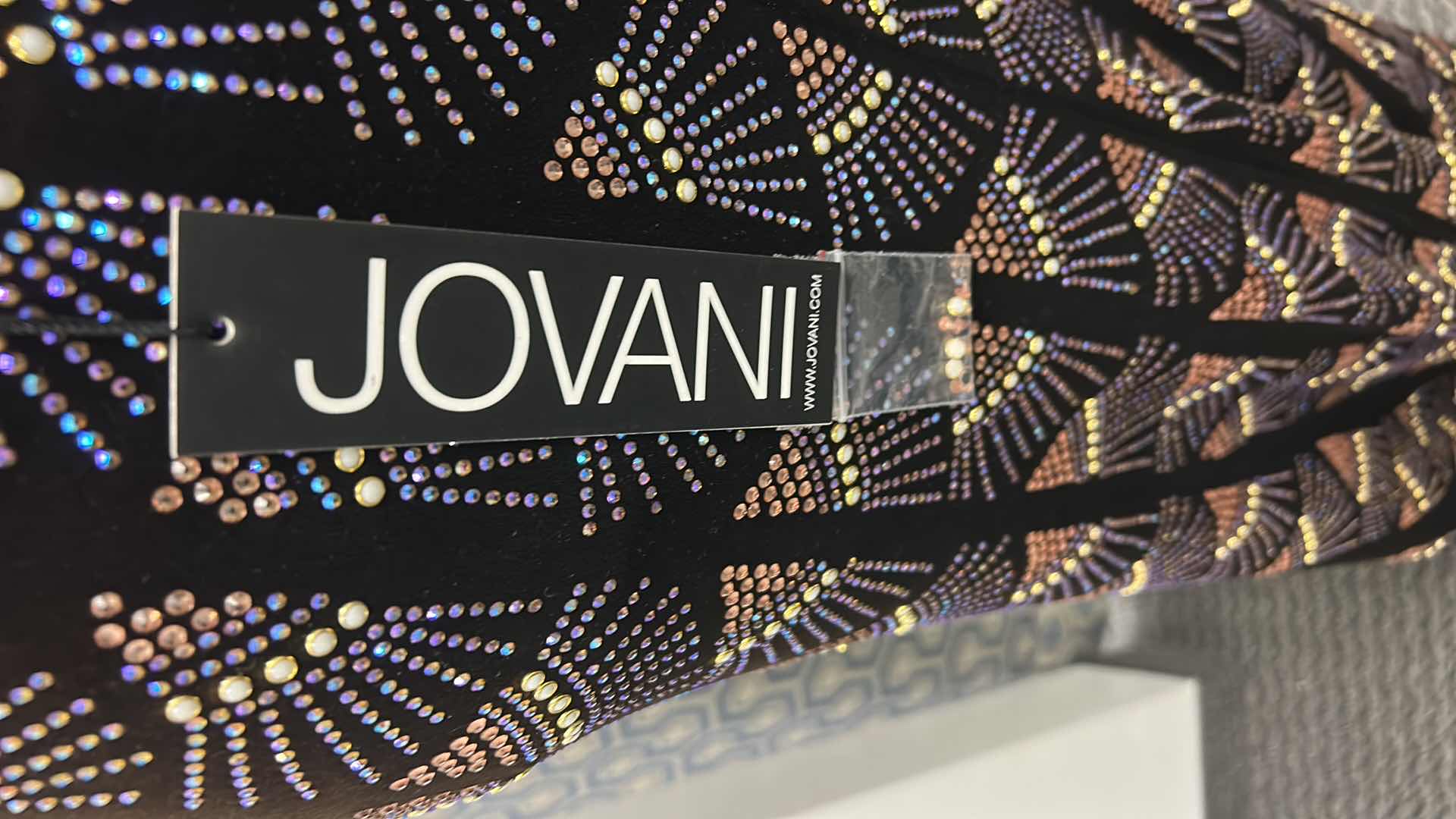 Photo 1 of EVENING GOWN, "JOVANI" FLOOR LENGTH FITTED GOWN IN THE SHADE COFFEE, ALL OVER GEOMETRIC SEQUIN PATTERN IN SILVER AND BLUE THAT CHANGES IN LIGHT SIZE 2