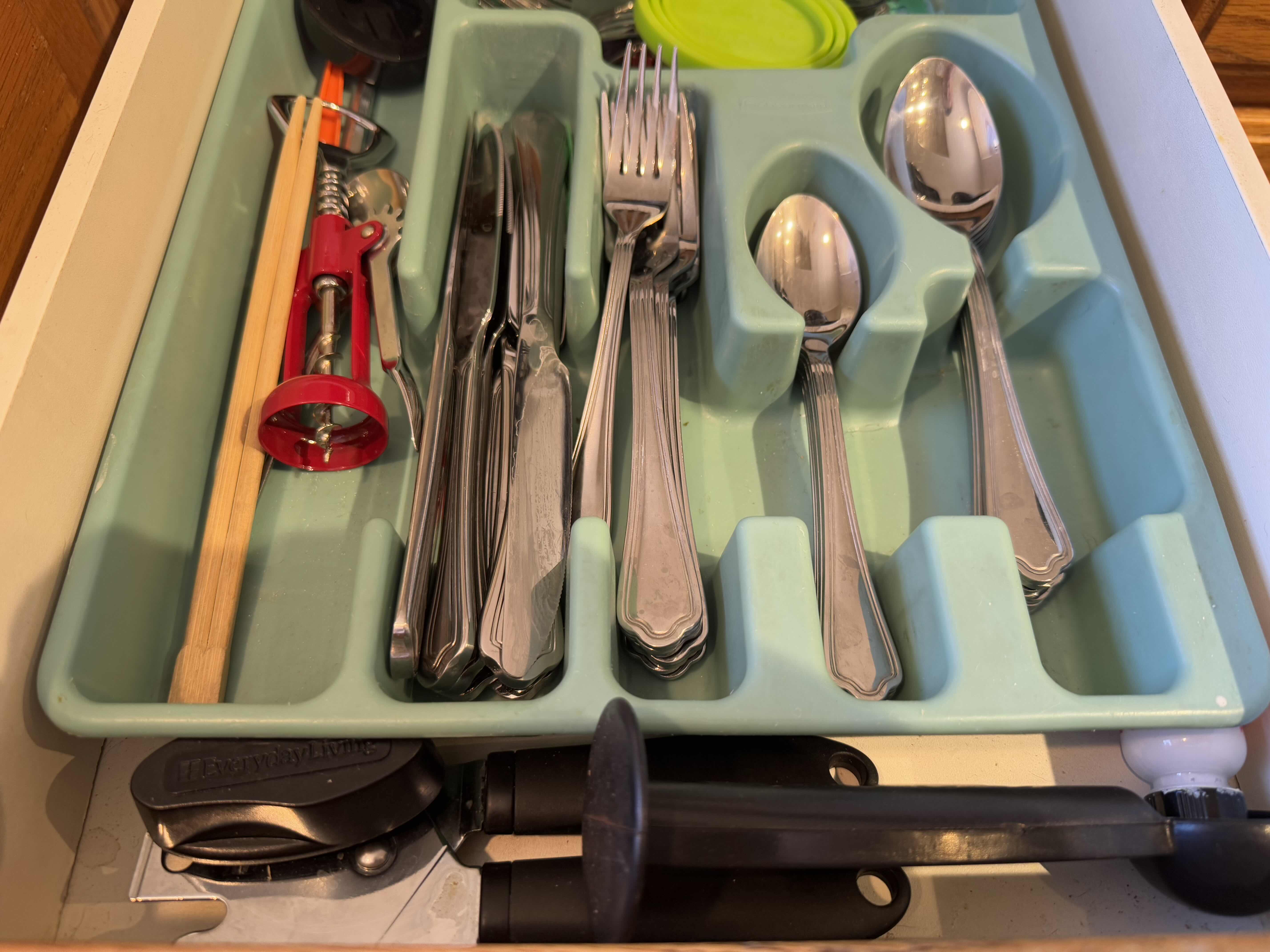 Photo 1 of CONTENTS OF KITCHEN DRAWER. ASSORTED FLATWARE, AND UNTENSILS.