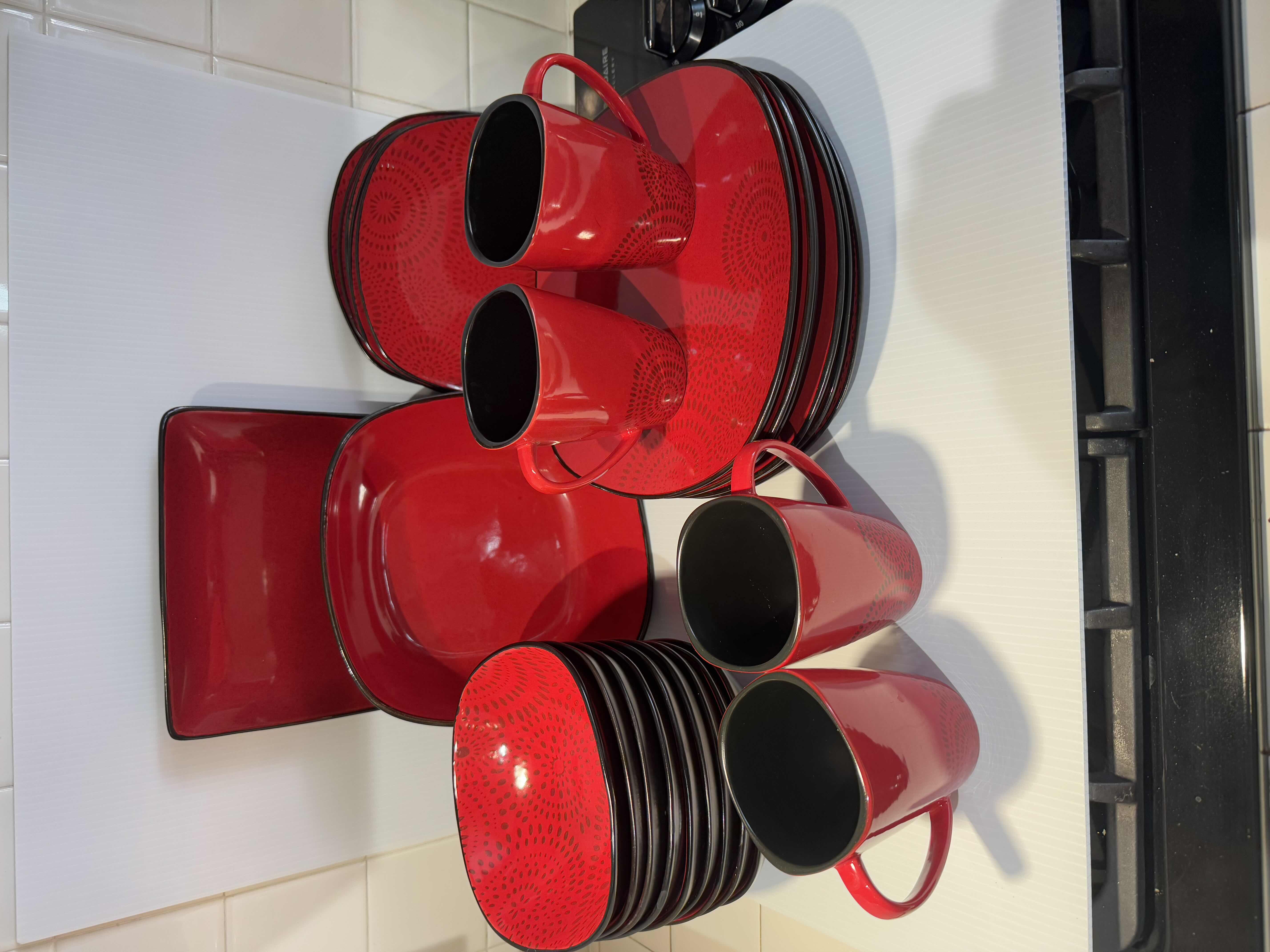 Photo 1 of 26 PIECE DINNER DISHES SET. RED AND BLACK DESIGNS. SOUP BOWLS, BREAD PLATES, COFFEE MUGS.