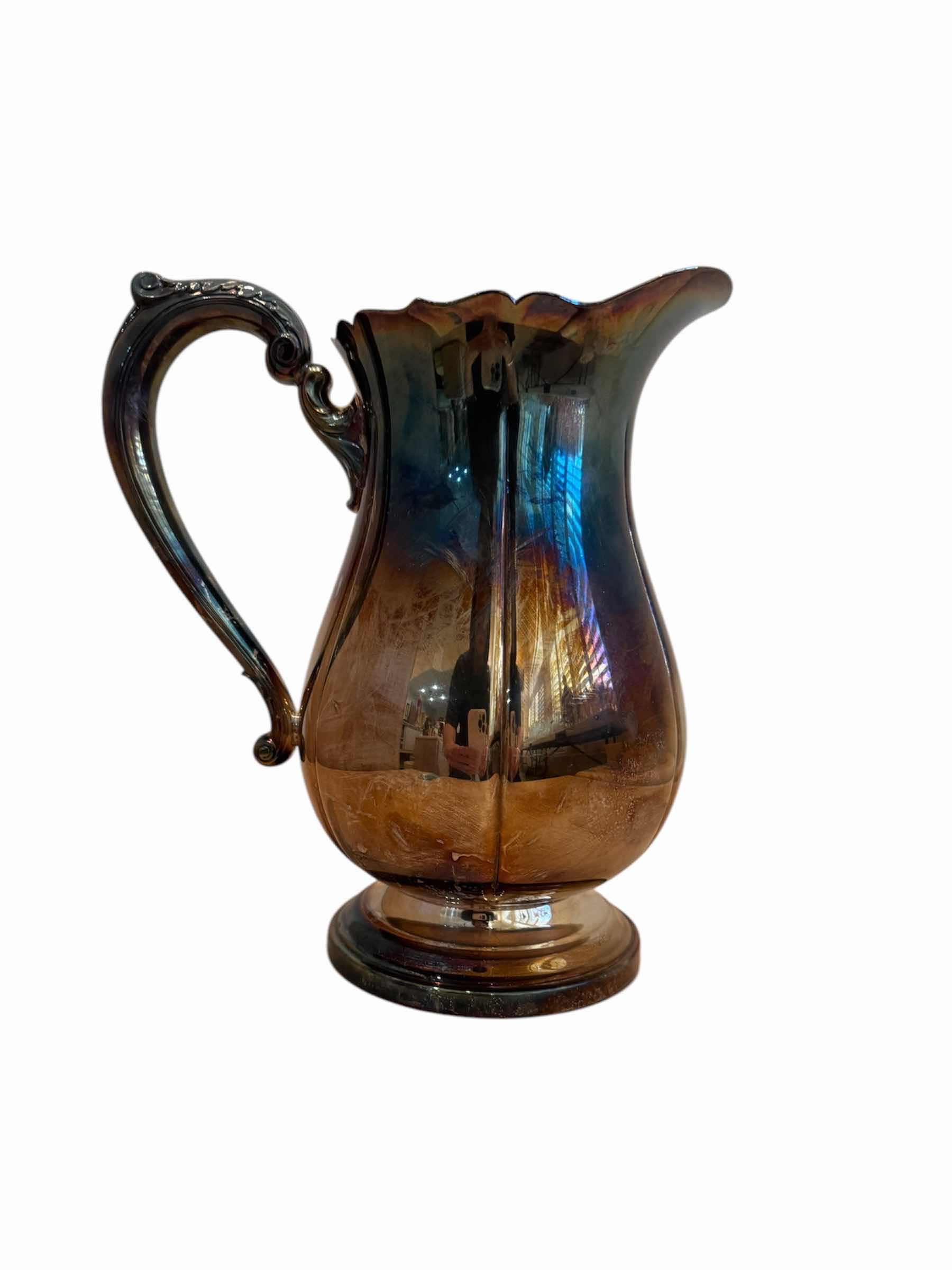 Photo 1 of VINTAGE ANTIQUE SILVER PITCHER 

8” X H9”