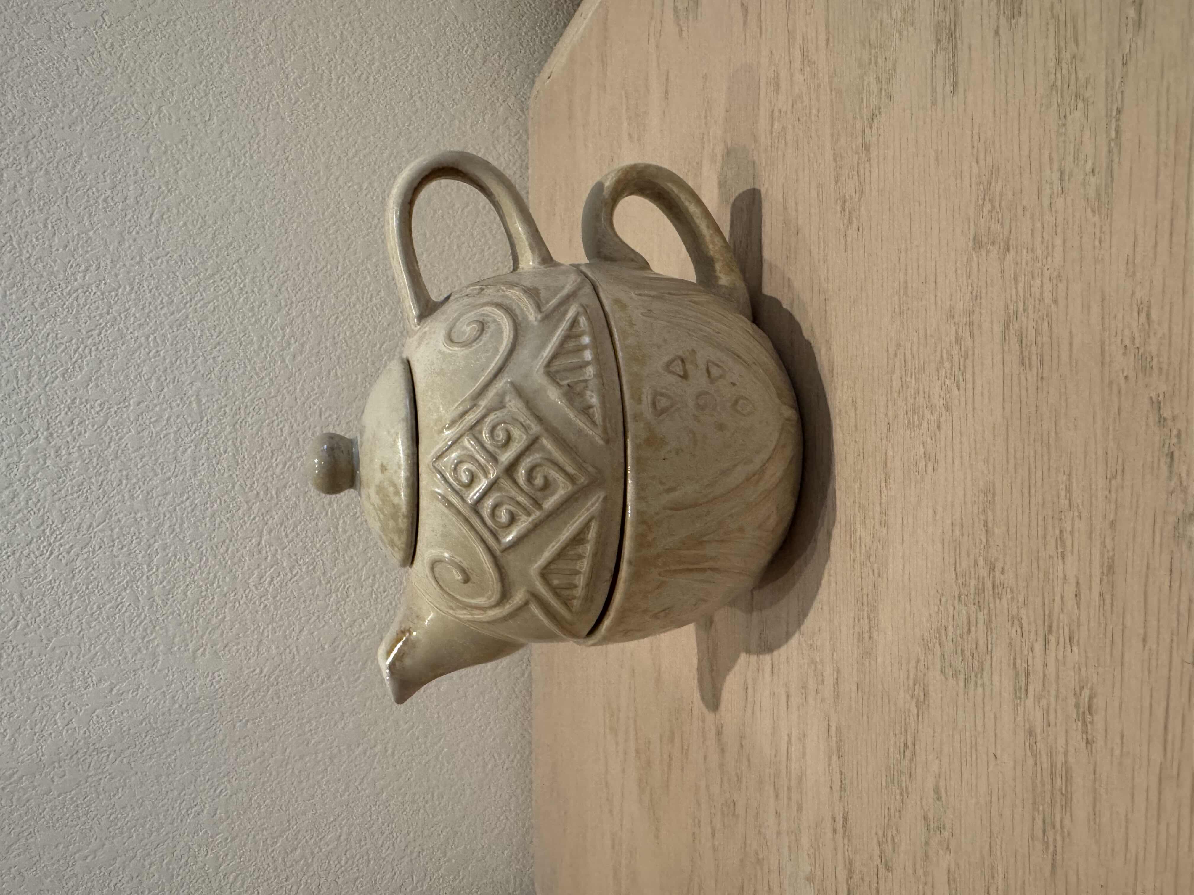 Photo 1 of POTTERY TEA FOR ONE TEAPOT AND TEACUP, CERAMIC

7” X H5.75”
