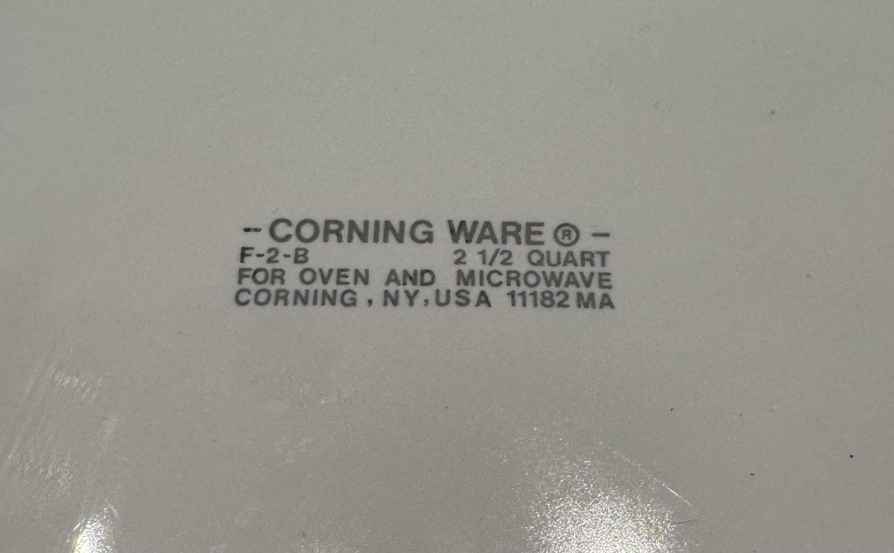 Photo 1 of CORNING WARE 2 1/2 QUART OVAL CASSEROLE DISH AND GLASS SERVING PLATTER 11.5” X 9” X H1.25”
