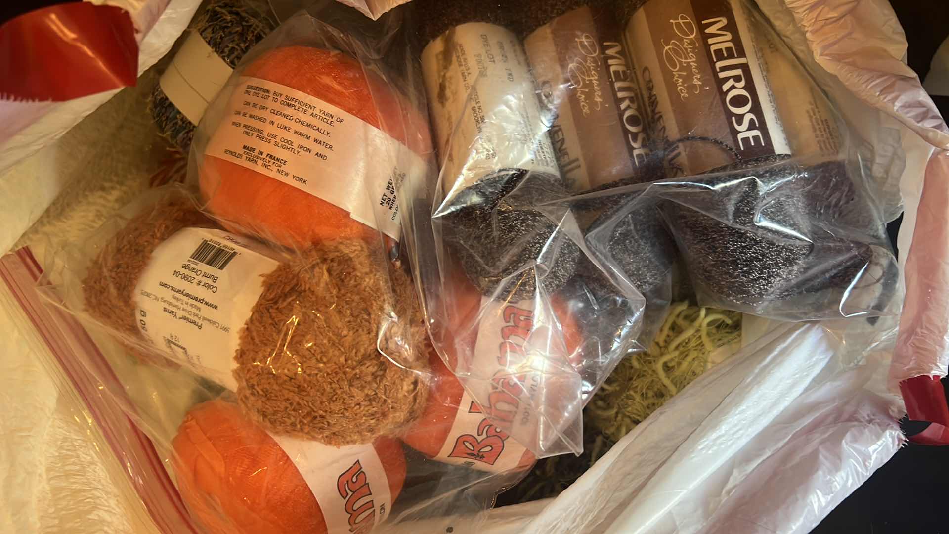 Photo 1 of CONTENTS OF BAG: YARN IN ASSORTMENT OF COLORS