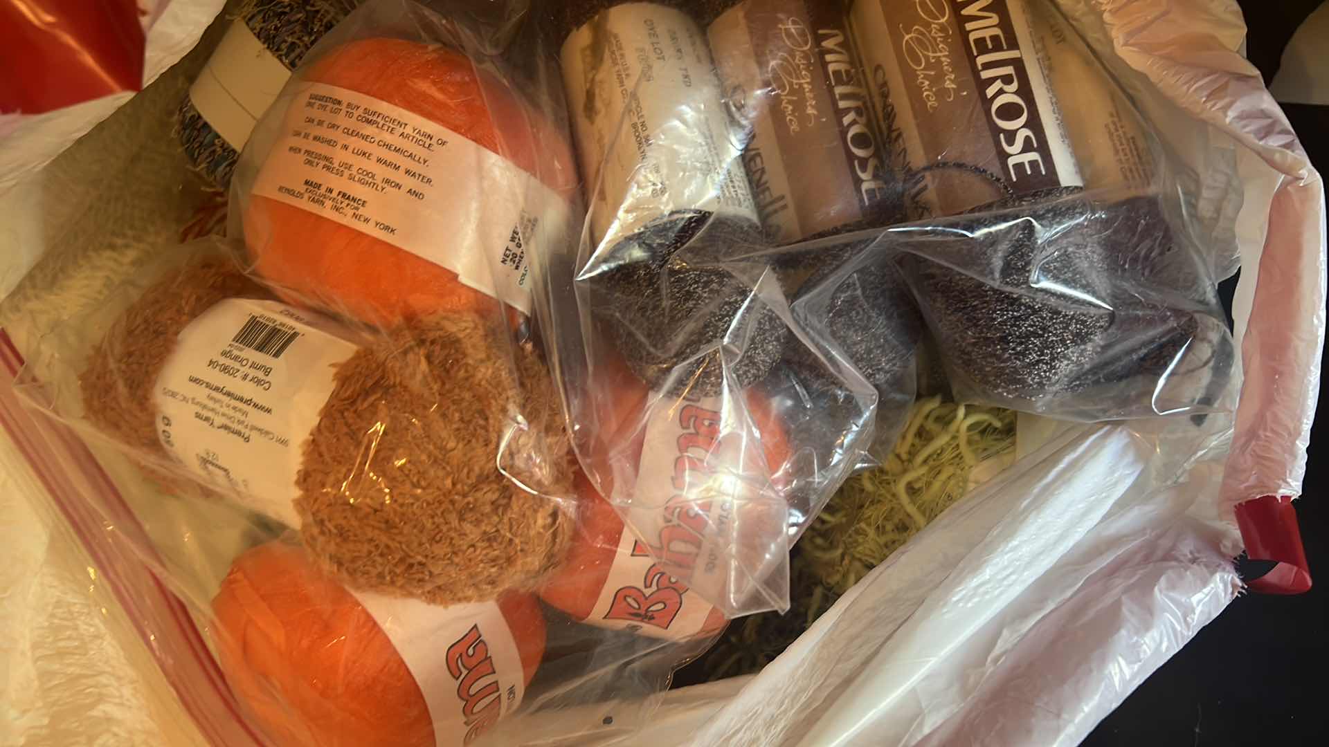 Photo 1 of CONTENTS OF BAG: YARN IN ASSORTMENT OF COLORS