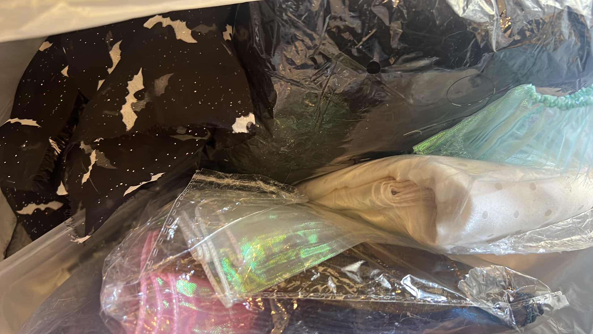 Photo 1 of CONTENTS OF BAG: MUTIPLES OF FABRICS ASSORTMENT OF COLORS