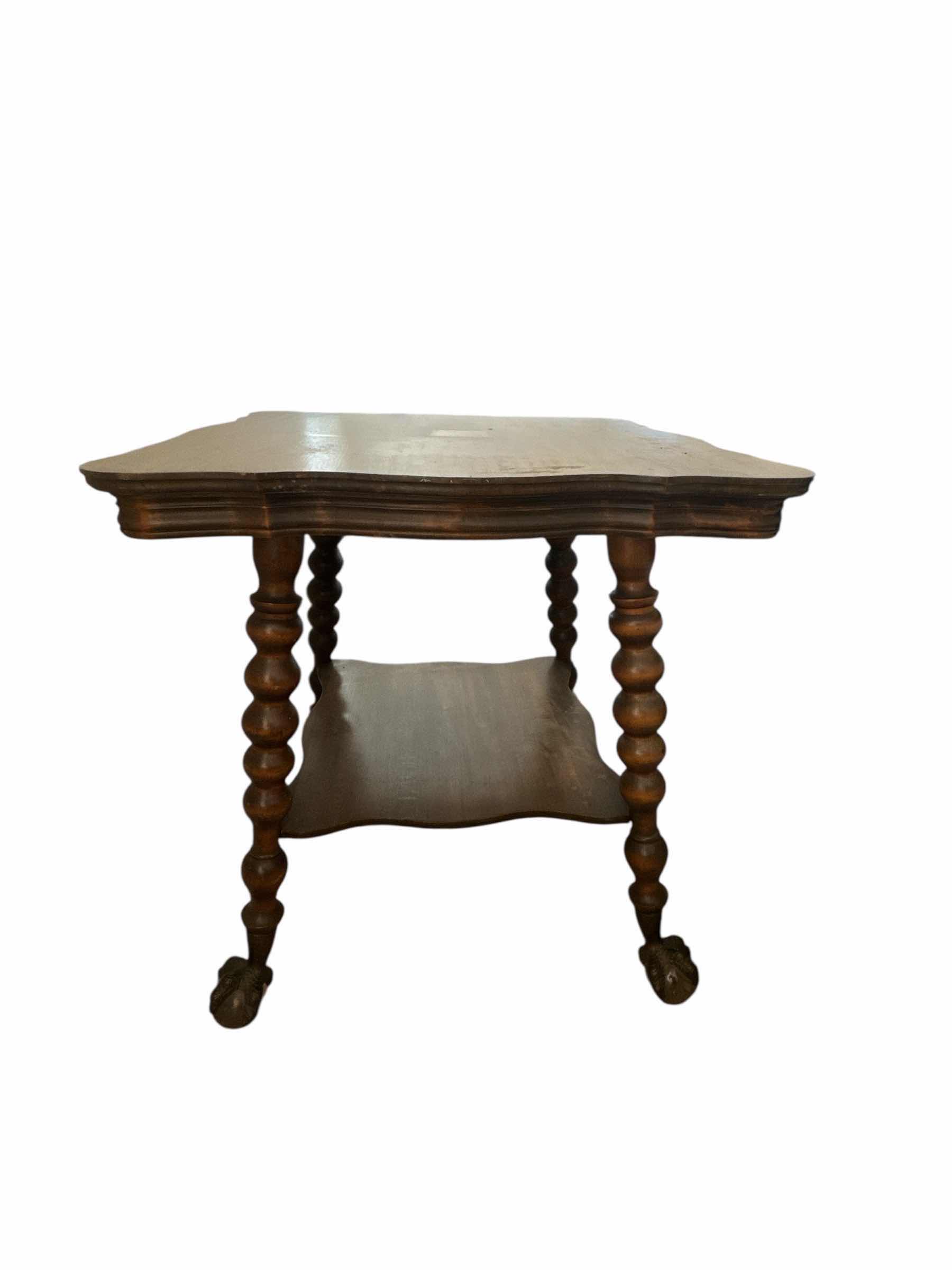 Photo 1 of 500
ANTIQUE CLAW AND BALL OAK TABLE
28“ x 28“ H30 “