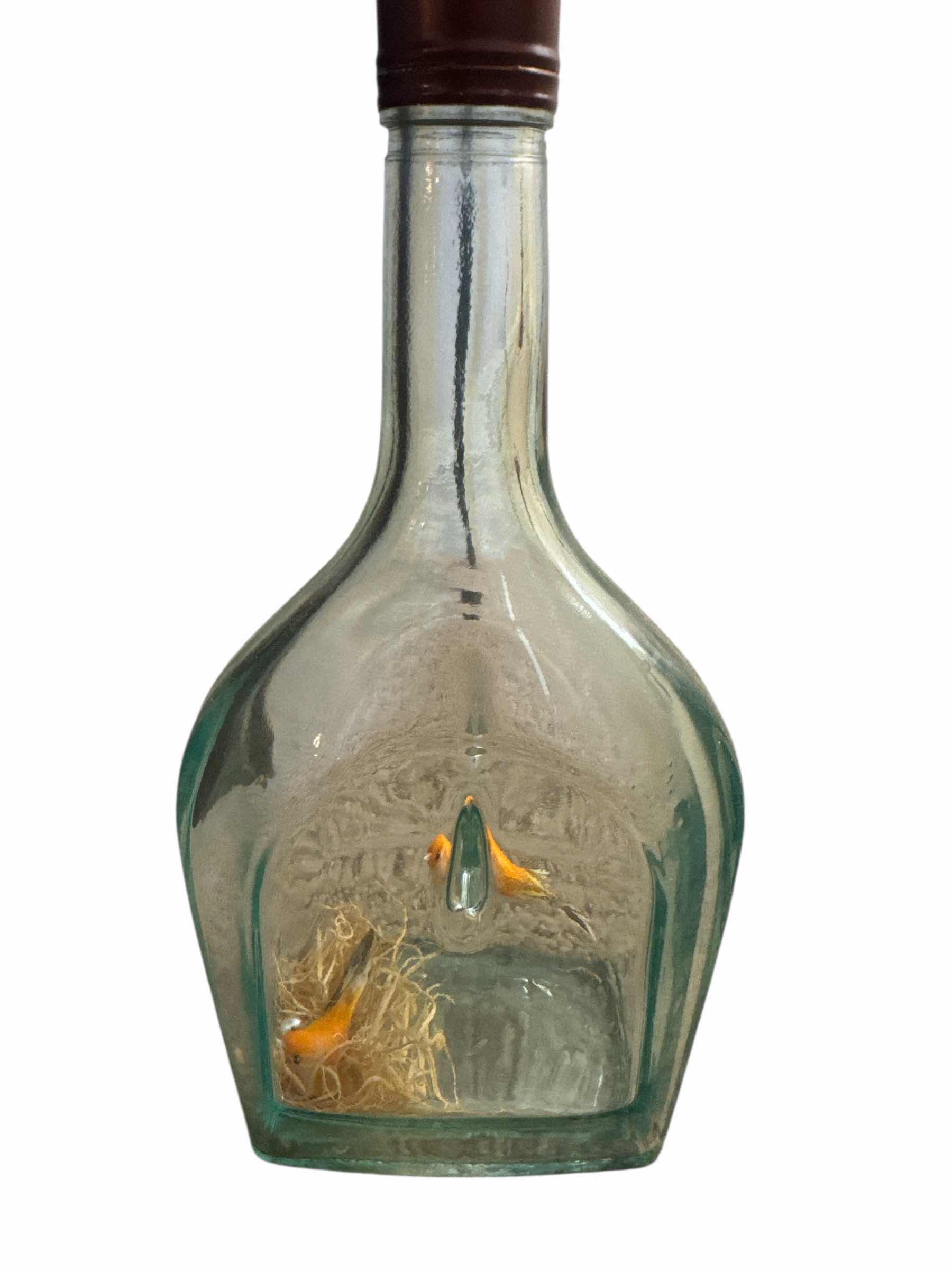 Photo 1 of VINTAGE BOTTLE WITH BIRDS AND NEST WITHIN