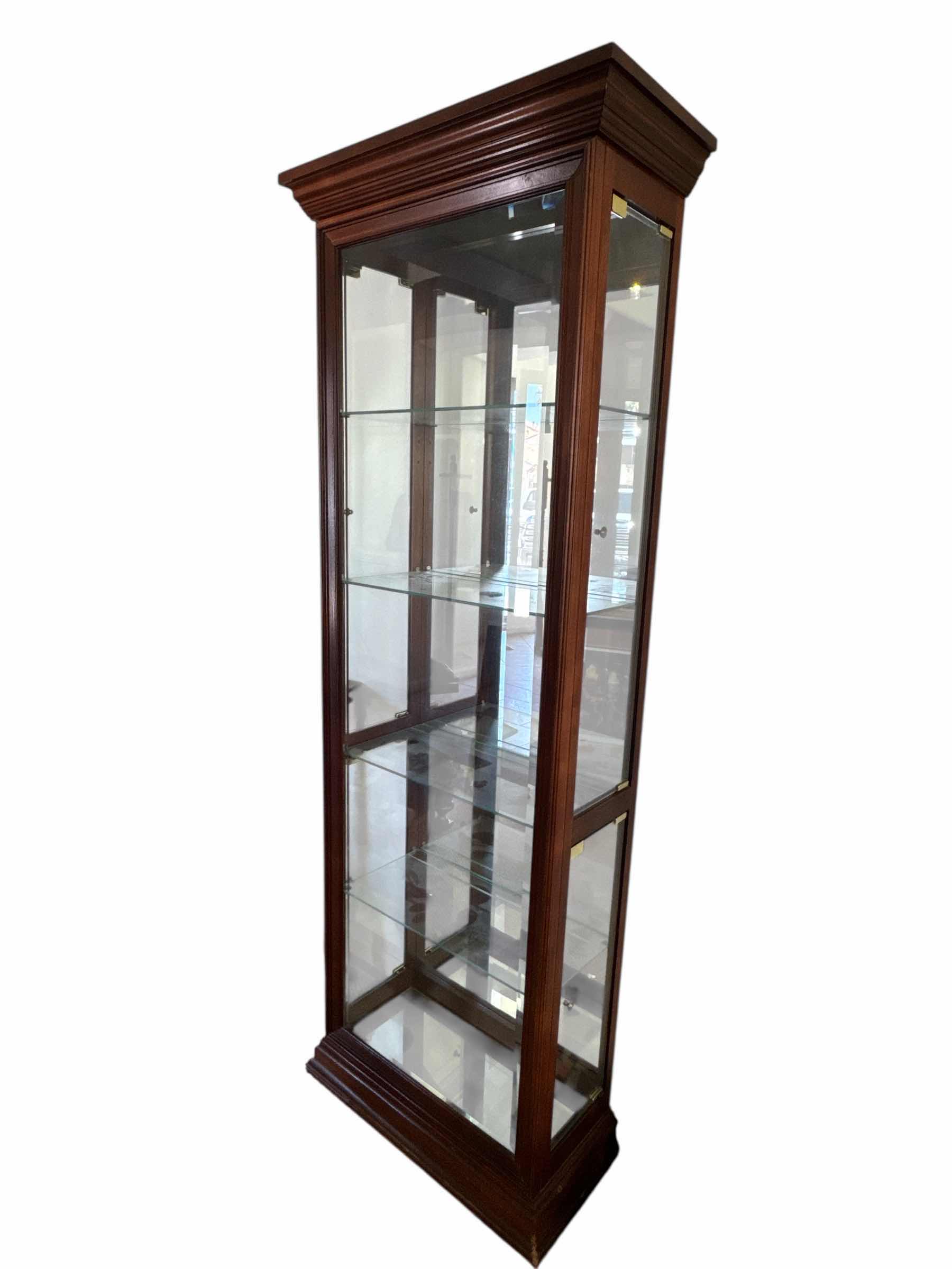 Photo 1 of CHERRY STAINED CURIO CABINET
12“ x 24“ H 77”