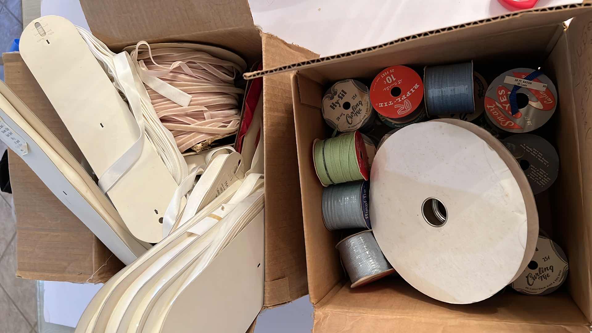 Photo 1 of 2 - BOXES OF RIBBON AND TRIM