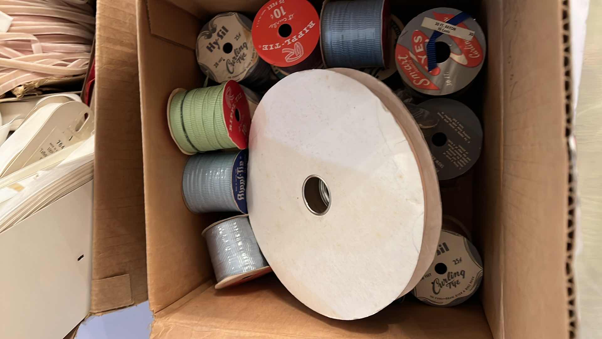 Photo 1 of 2 - BOXES OF RIBBON AND TRIM