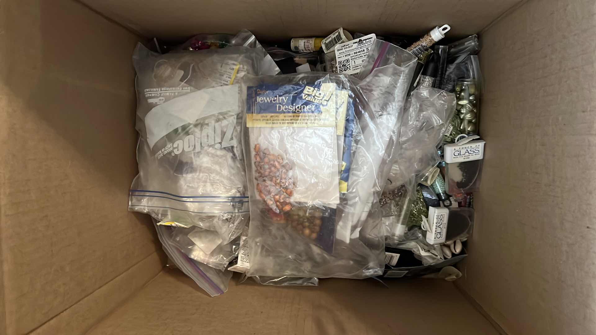 Photo 1 of BOX OF PACKETS AND VIALS OF CRAFT AND JEWELRY BEADS
