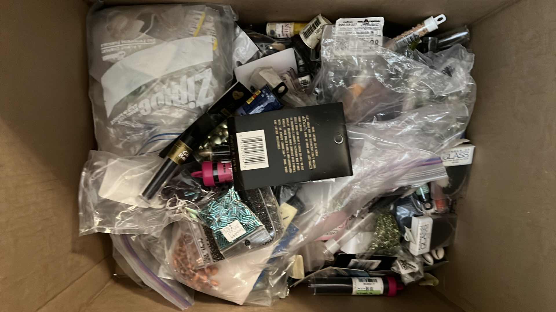 Photo 1 of BOX OF PACKETS AND VIALS OF CRAFT AND JEWELRY BEADS