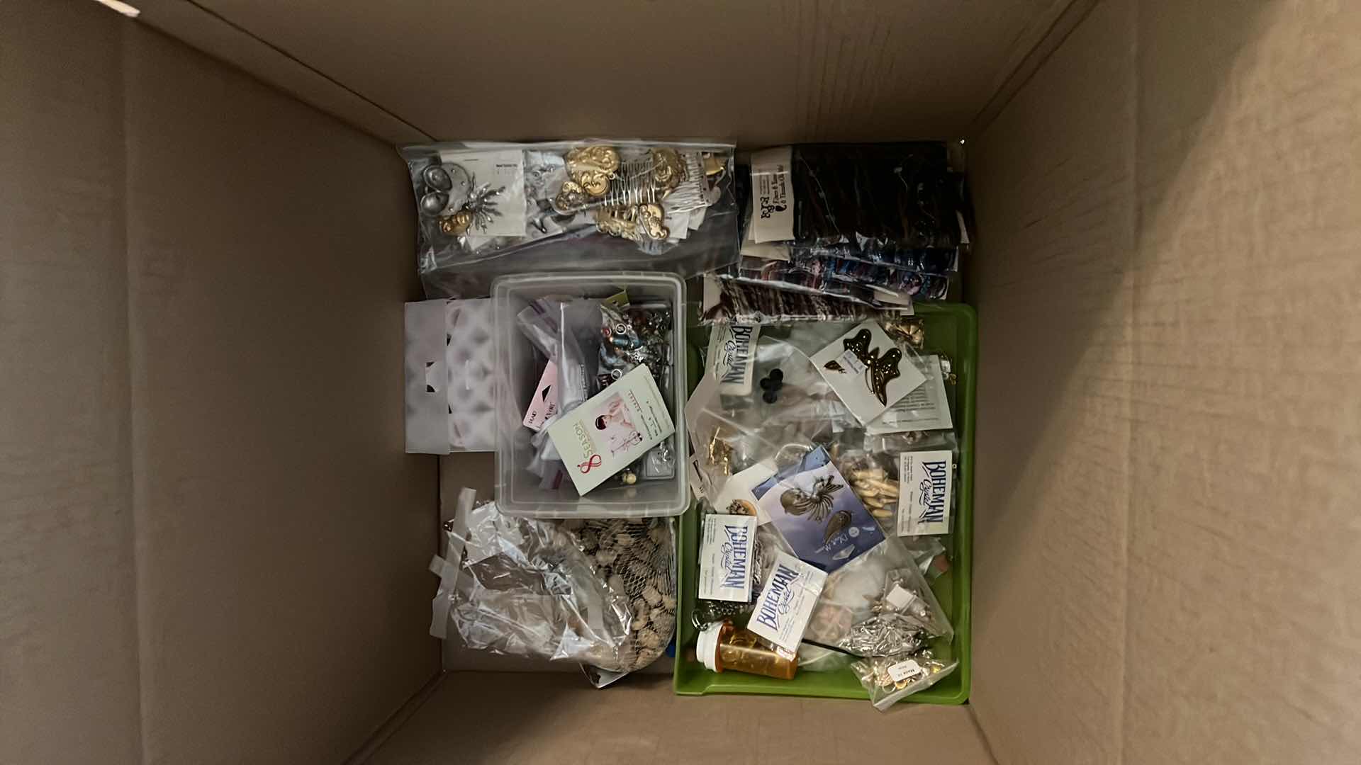 Photo 1 of BOX OF BEADS AND JEWELRY MAKING ITEMS -  FINDINGS AND MORE