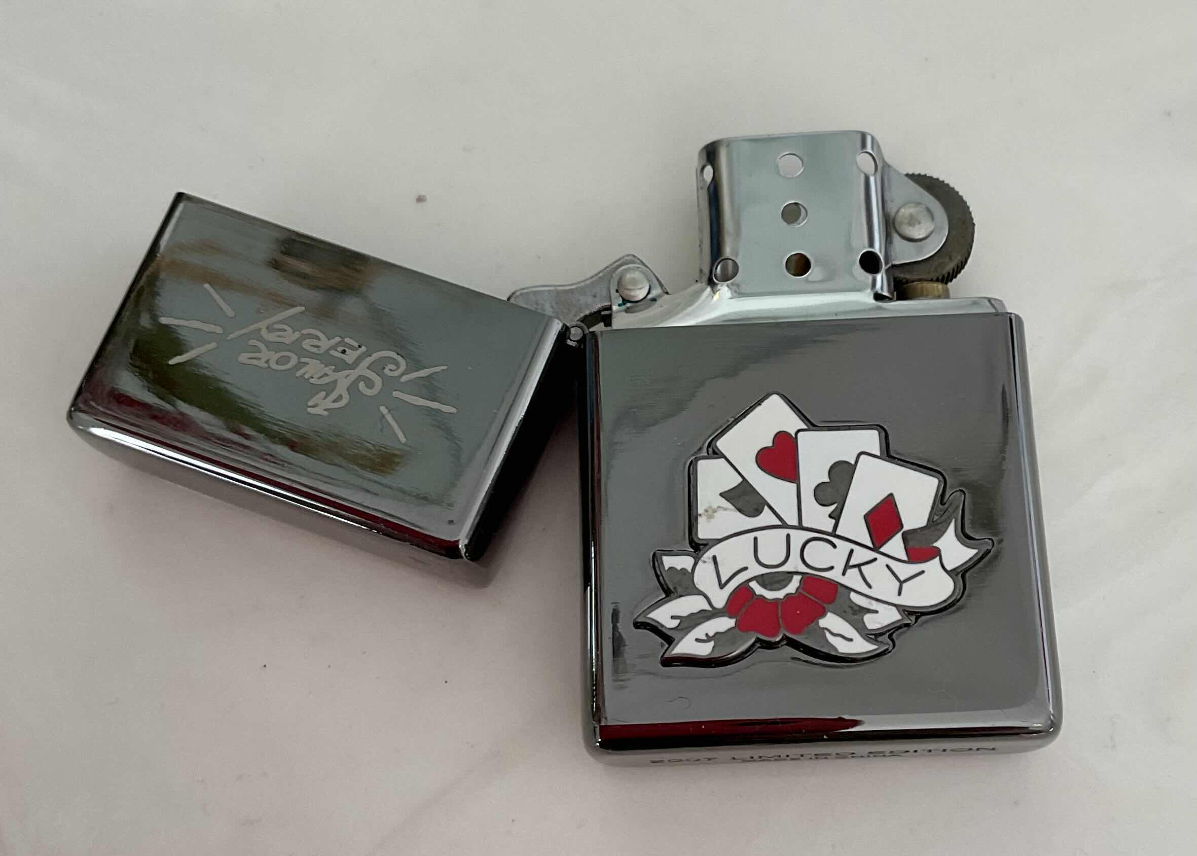 Photo 2 of ASSORTED LIGHTERS 2 ZIPPO LIGHTERS AND 1 TORCH LIGHTER